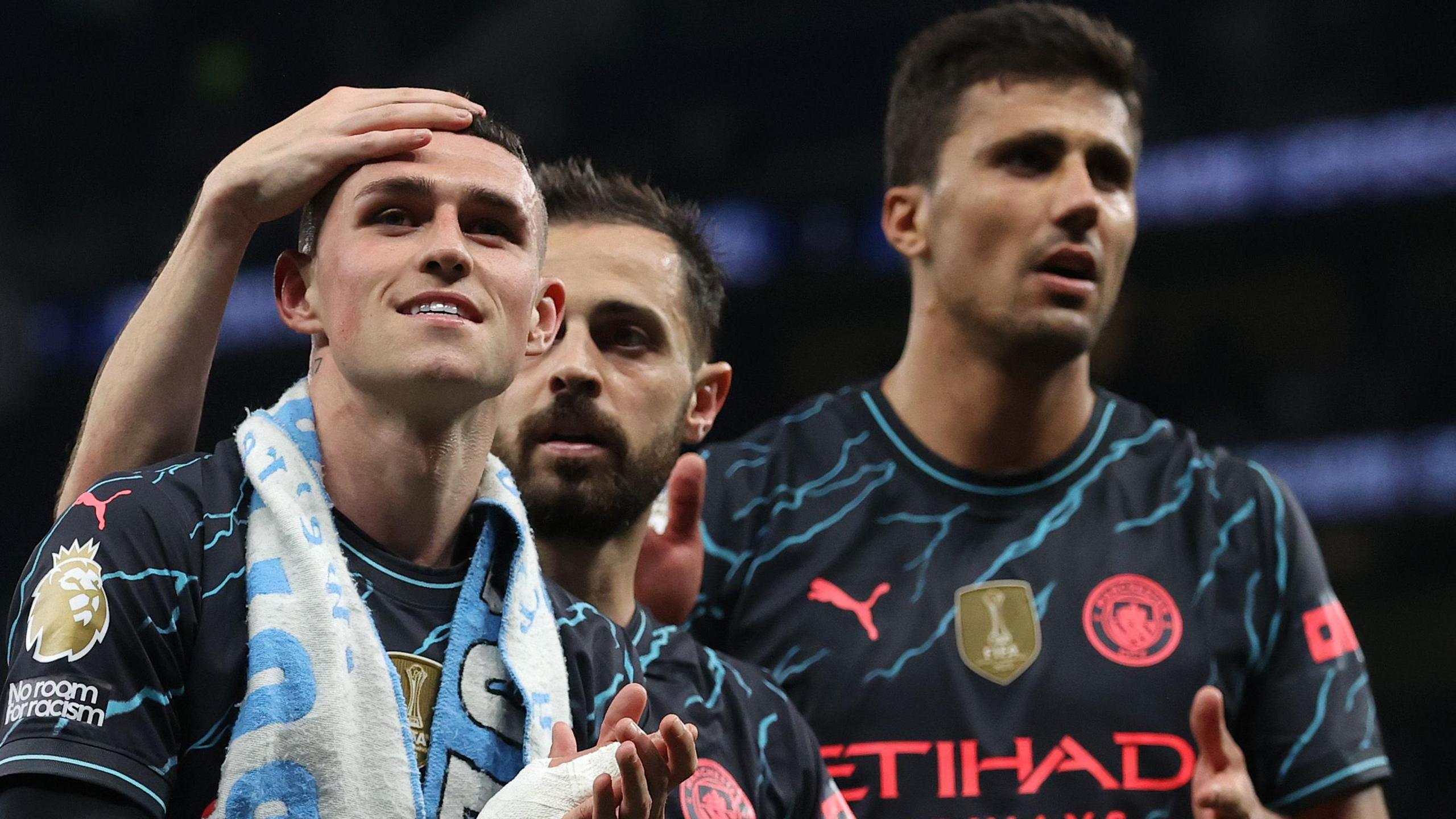 Phil Foden, Bernardo Silva and Rodri celebrate