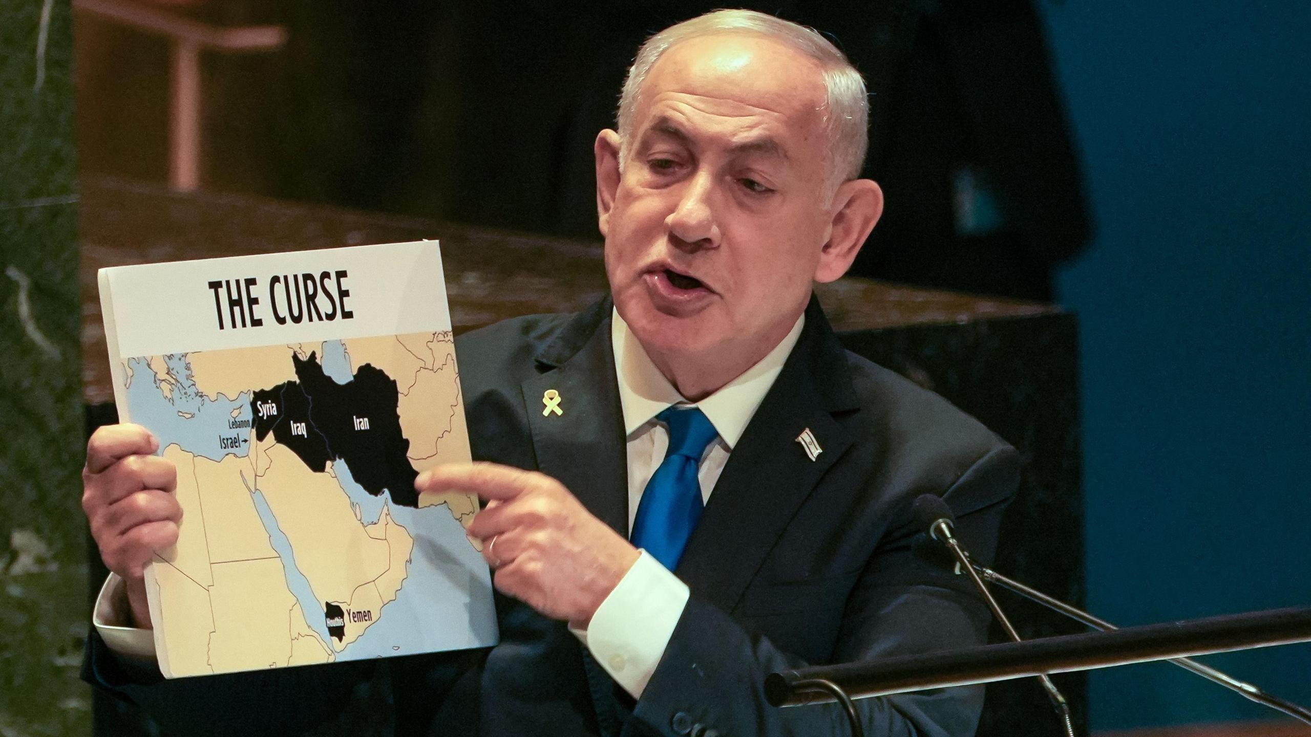 Israeli Prime Minister Benjamin Netanyahu shows a map as he addresses the United Nations General Assembly in New York.