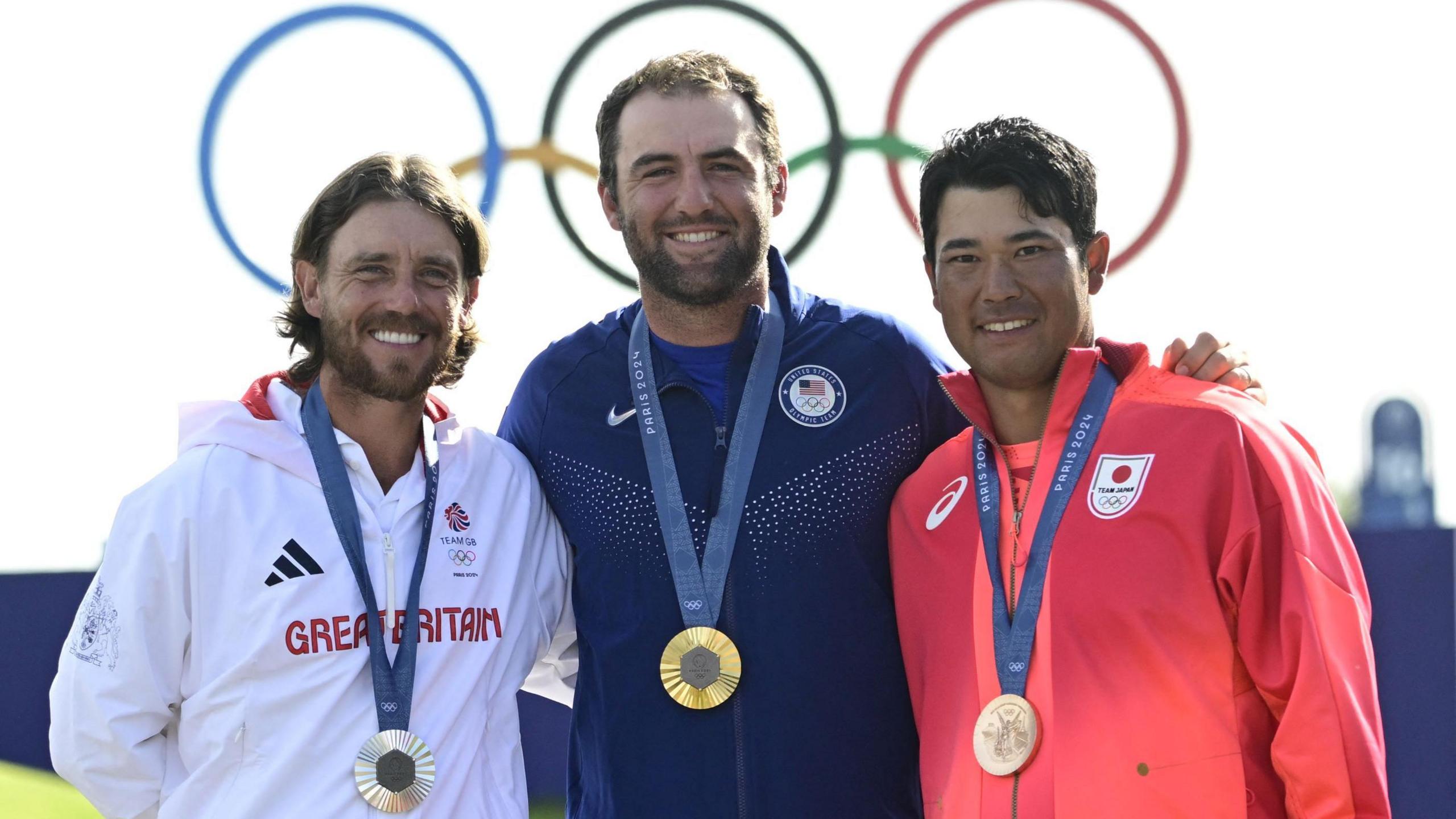 Tommy Fleetwood, Scottie Scheffler and Hideki Matsuyama with their Paris 2024 medals