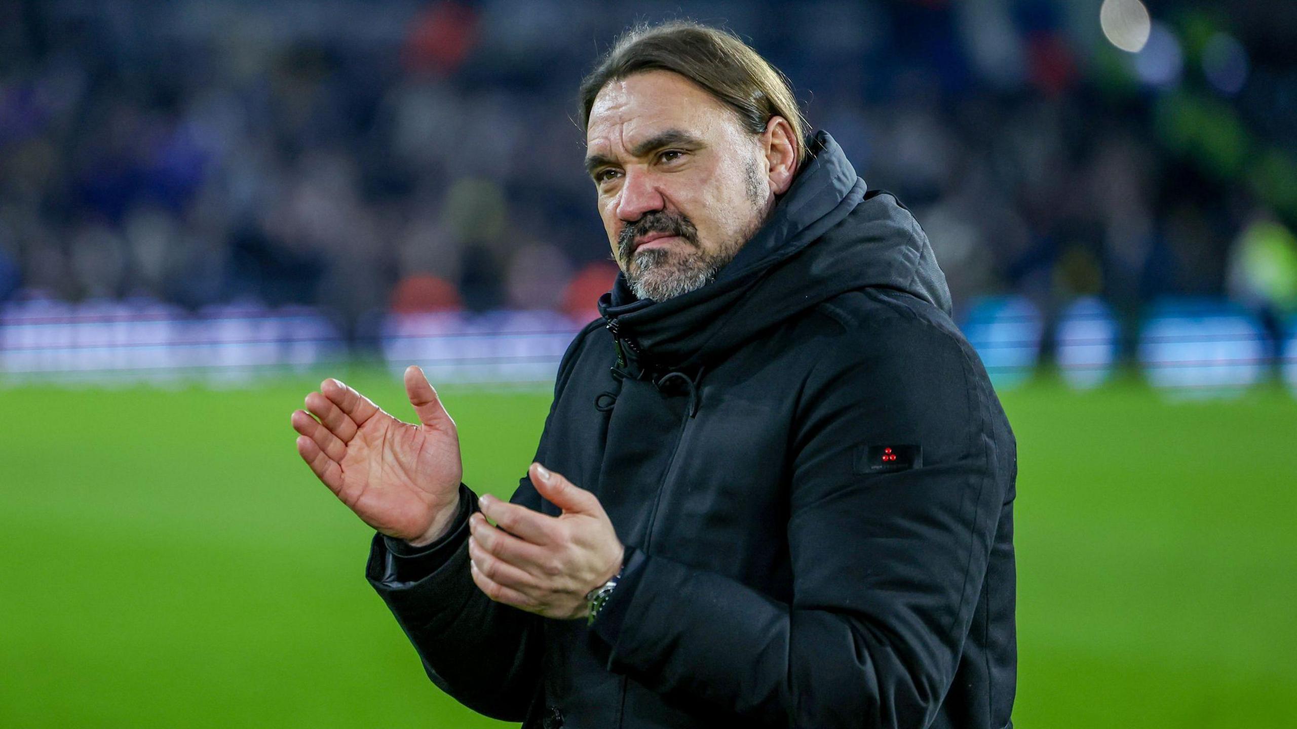 Leeds boss Daniel Farke applauding supporters