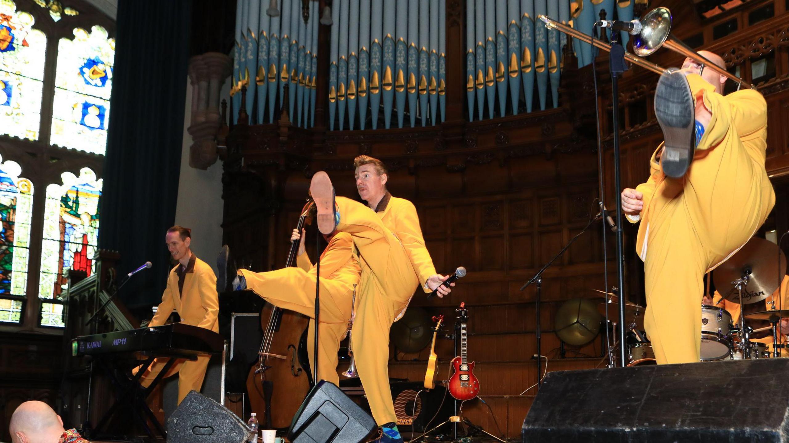 jive ces on stage in Derry's Guildhall