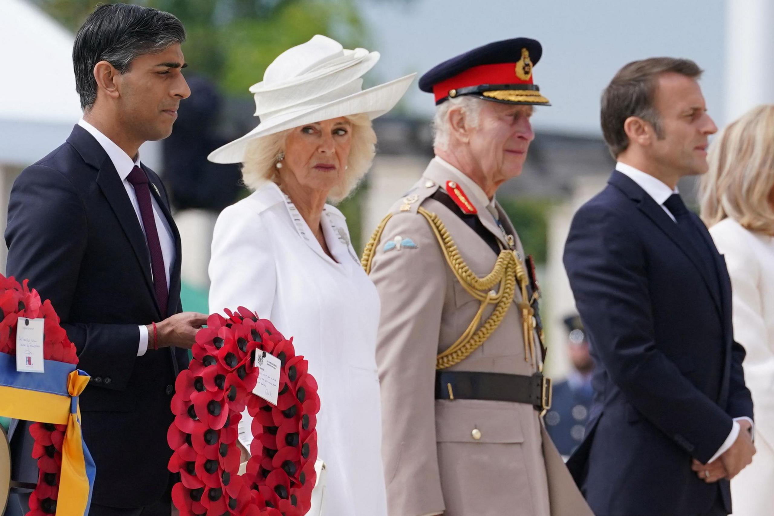 Rishi Sunak stands along side the King and Queen at D-Day event in Normandy