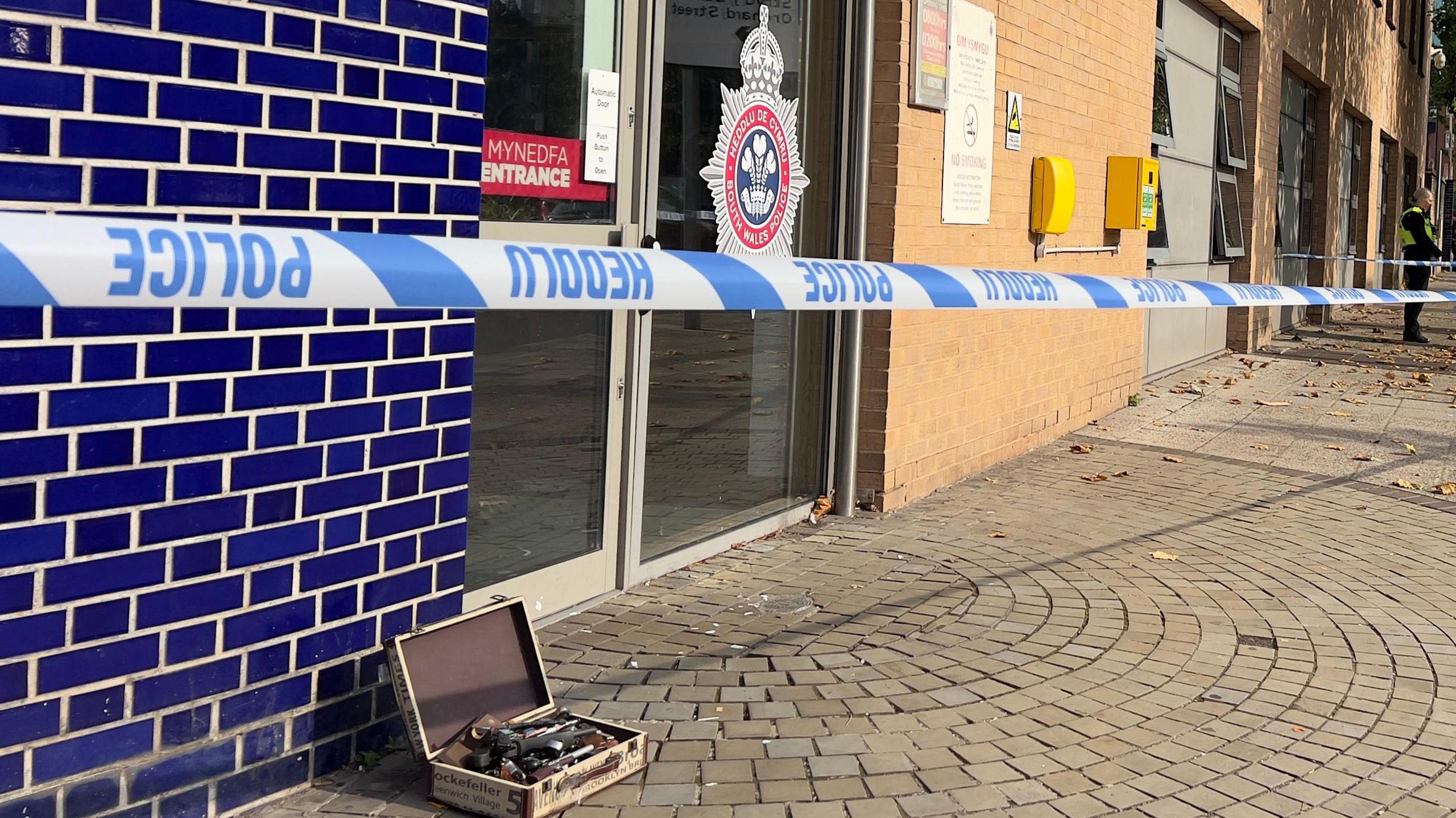 box outside the entrance to Swansea Central Police Station