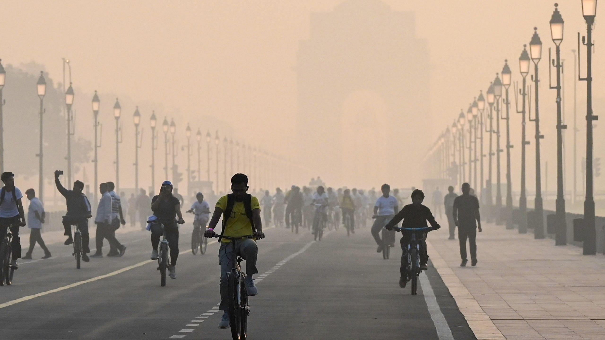people on bikes in Delhi