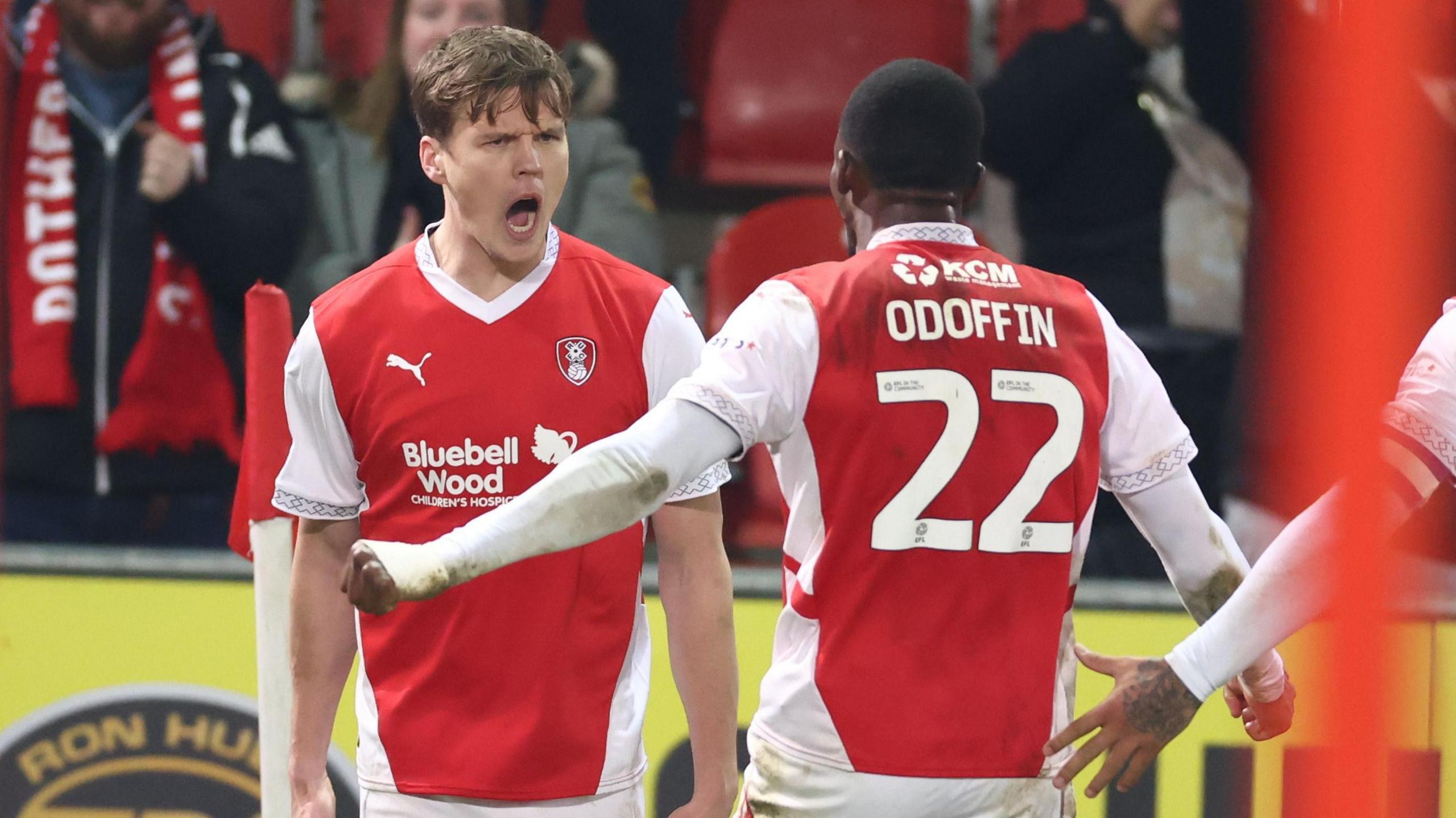 Sean Raggett screams in celebration after heading Rotherham into the lead against Lincoln 