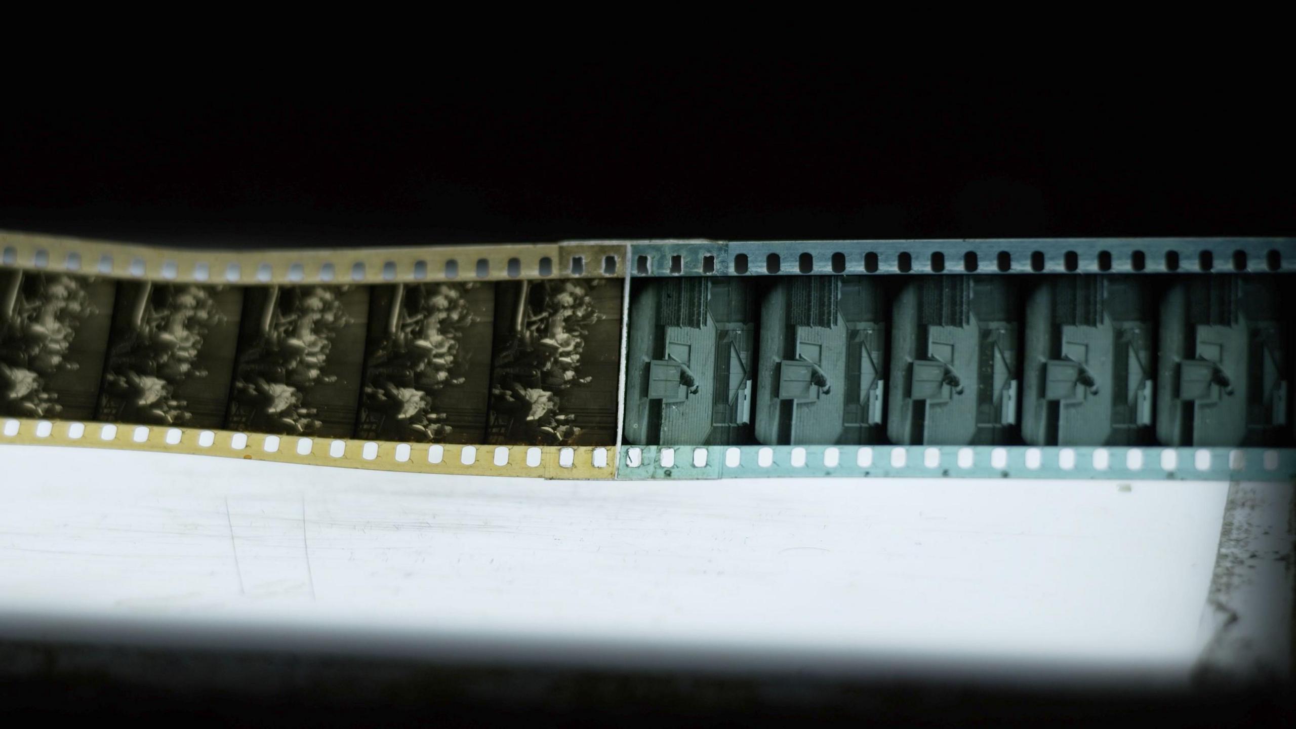 Film reel showing with one section in orange and another in blue to denote different scenes in the film