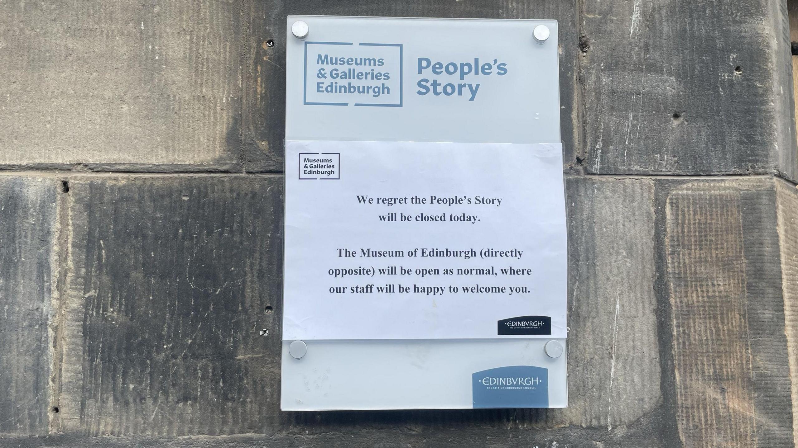 A notice pinned to the outside of the wall on the People's Story museum warning it will be closed.