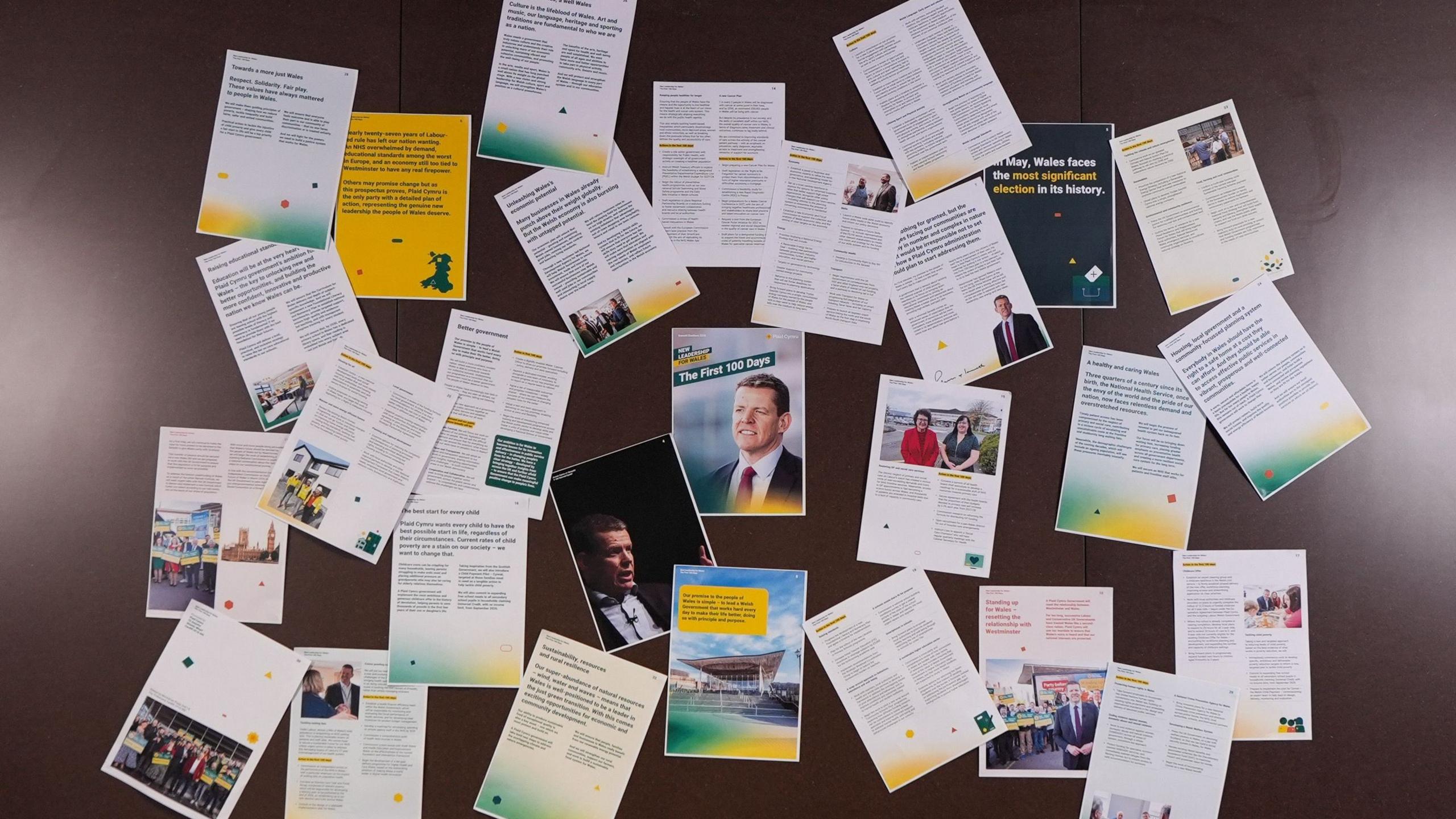 A set of documents attached to a Wall, with Plaid Cymru branding