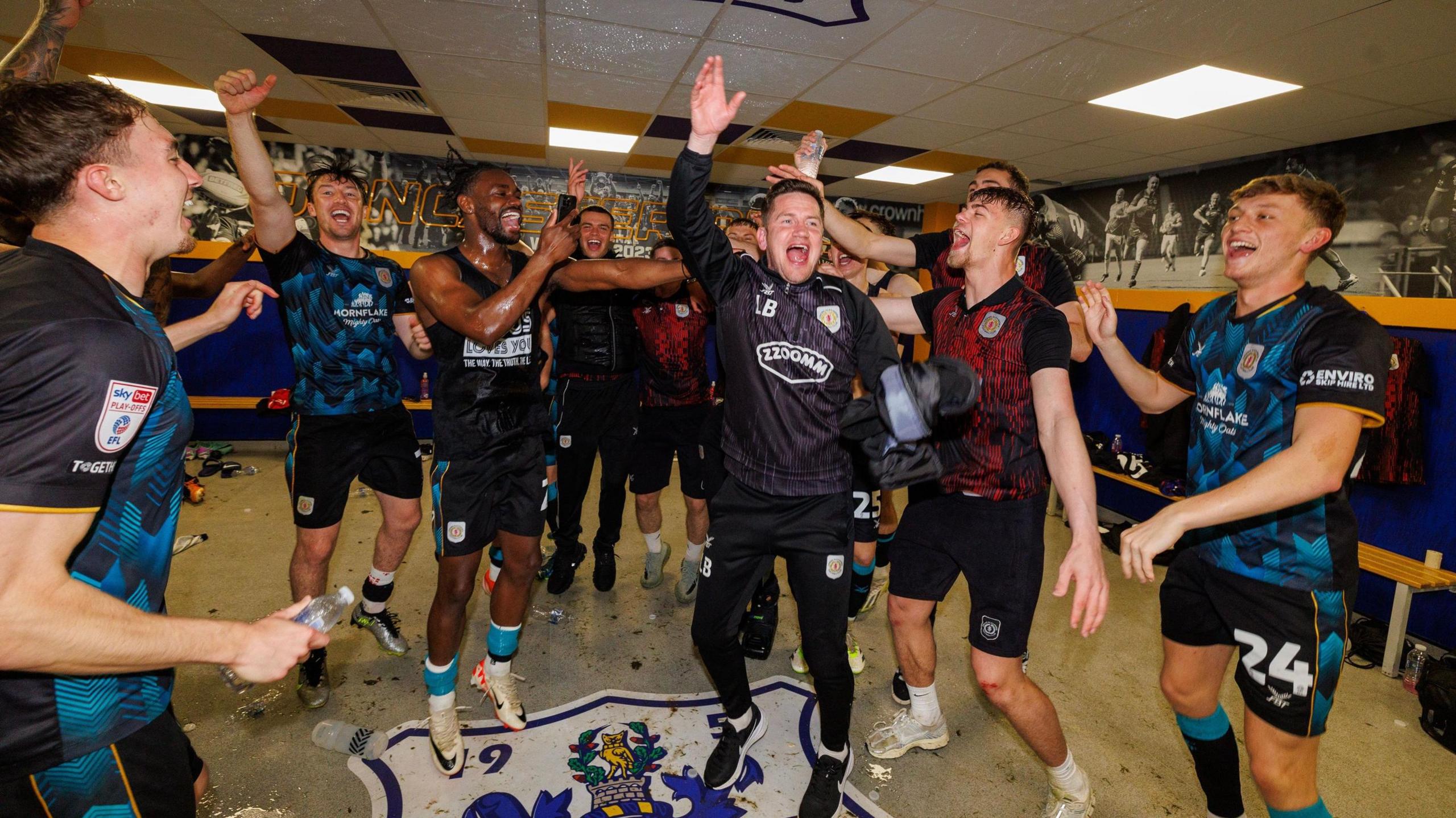 Crewe Alexandra manager Lee Bell and his players celebrate their victory over Doncaster Rovers in the semi-final of the League Two play-offs