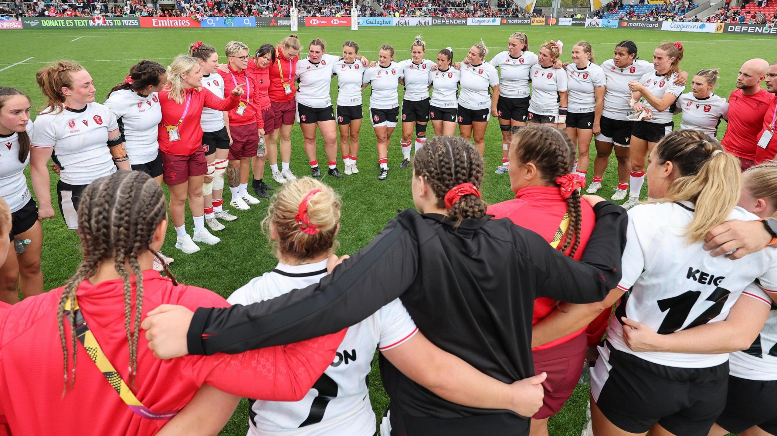 Wales in a huddle after their Rugby World Cup defeat to Canada