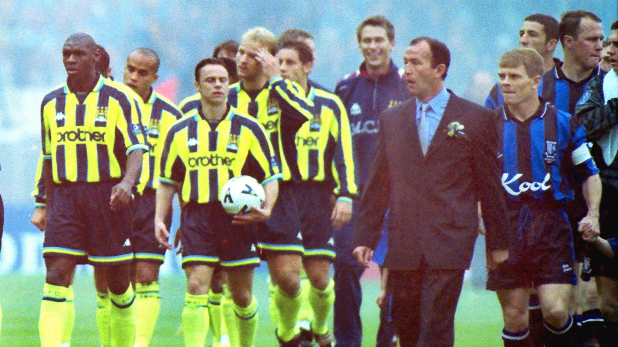 Pulis (front right) leads his Gillingham side out at Wembley for the 1999 League One play-off final. They lost to Manchester City on penalties
