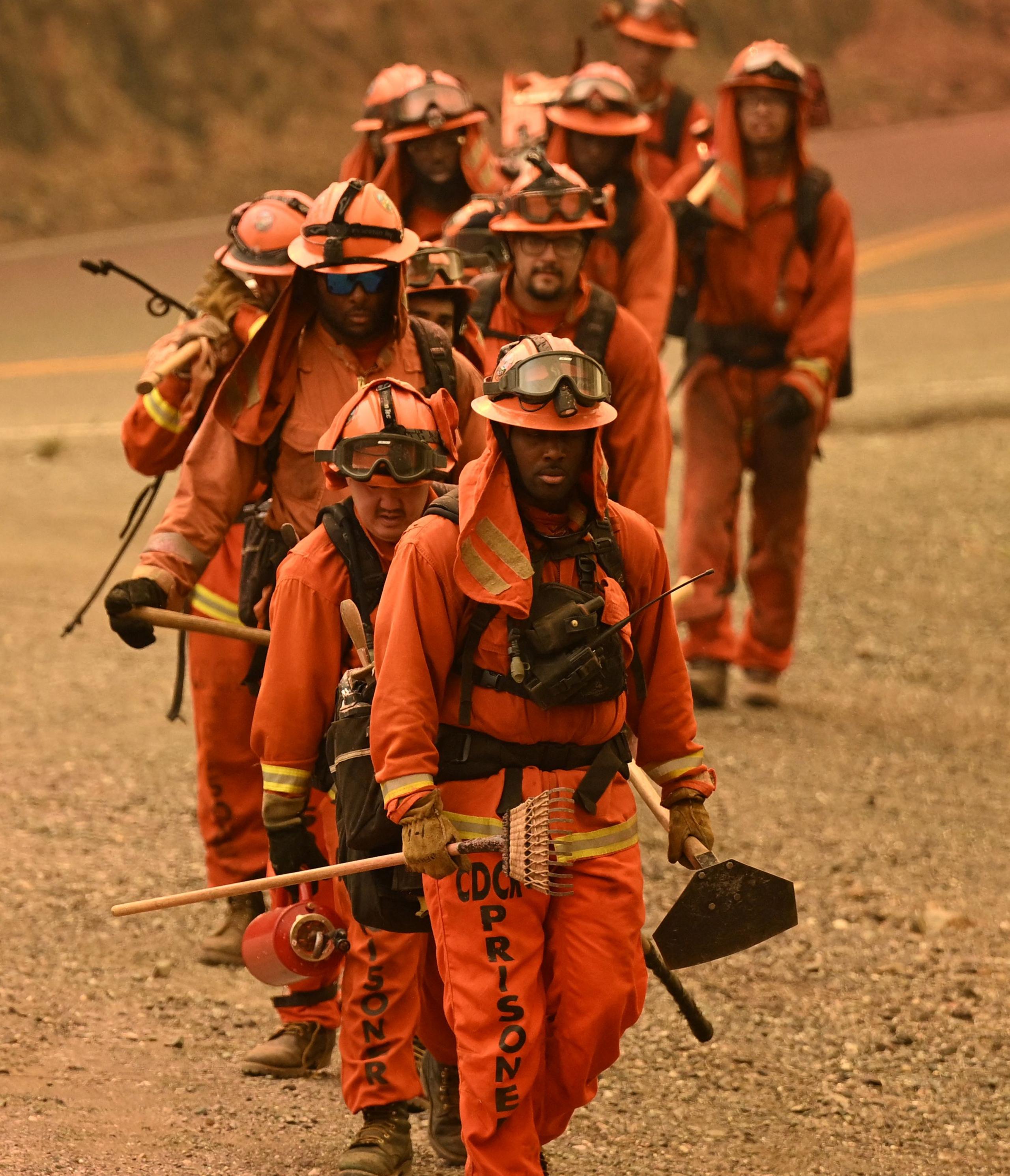 Inmate firefighters tasked with battling the Thompson fire in Oroville, California.