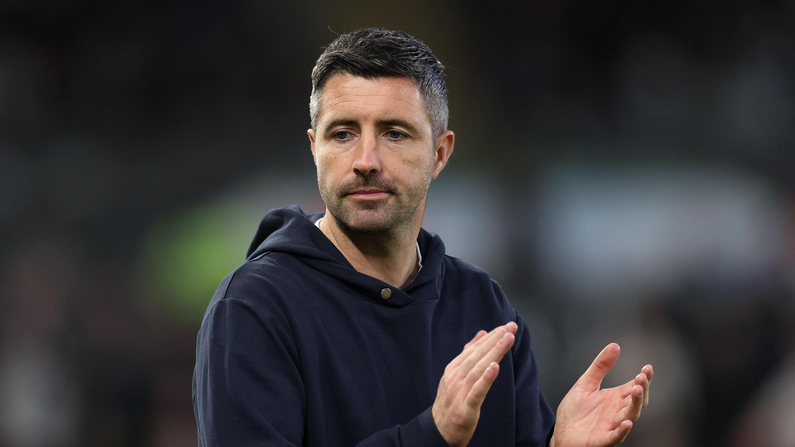 Alan Sheehan applauds