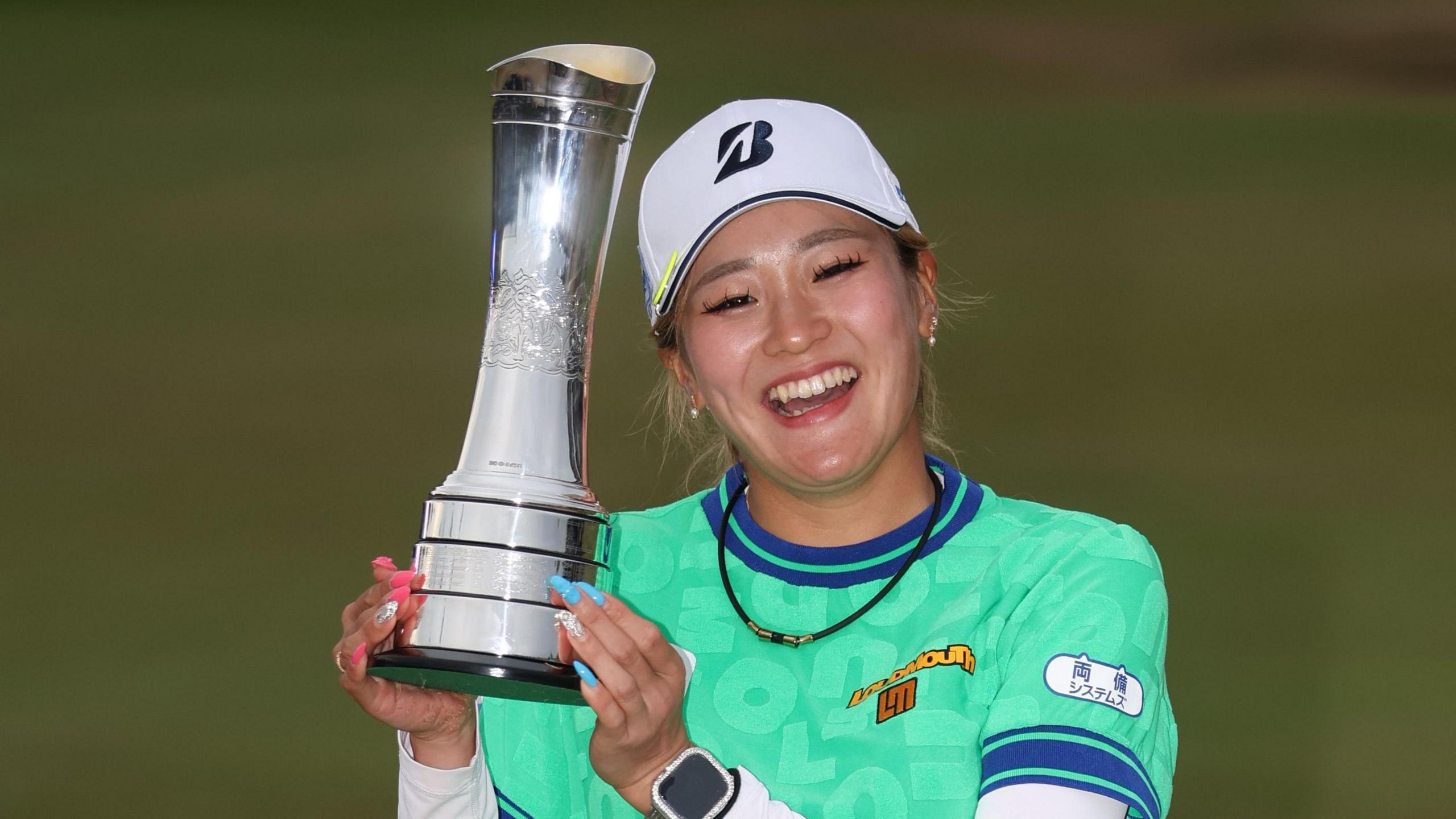 Shiho Kuwaki of Japan celebrates victory