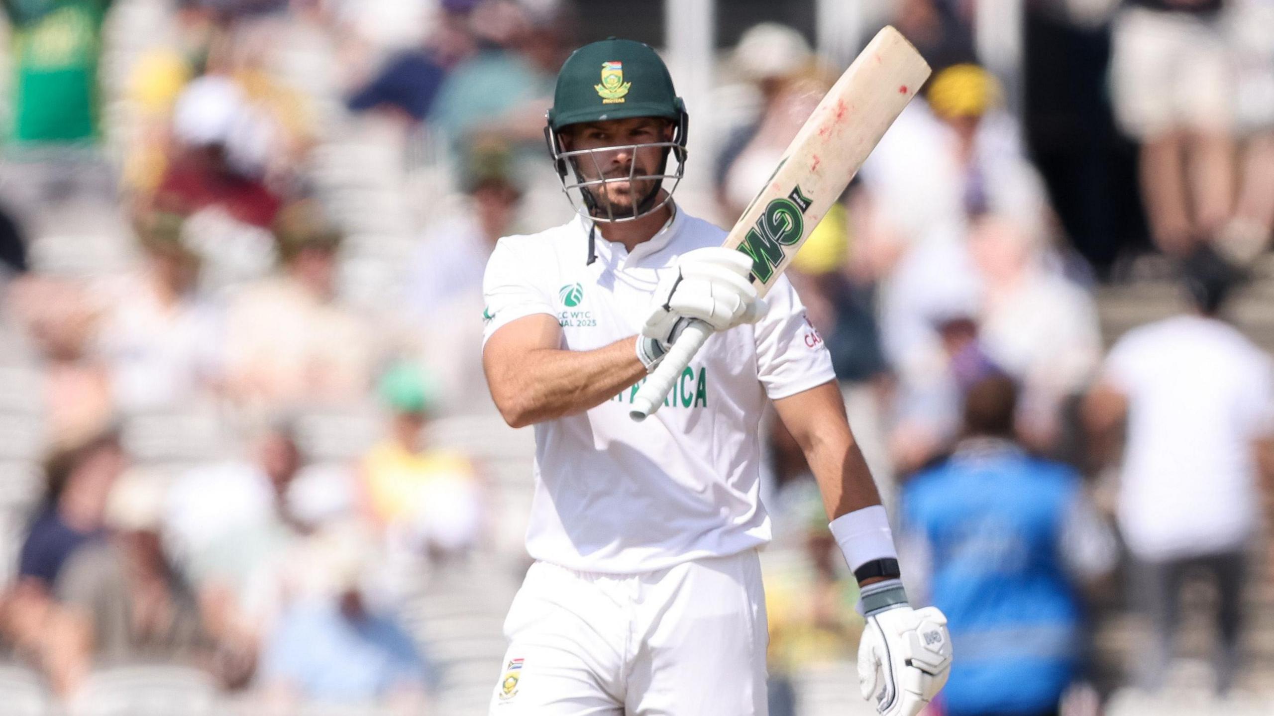 South Africa batter Aiden Markram salutes the crowd