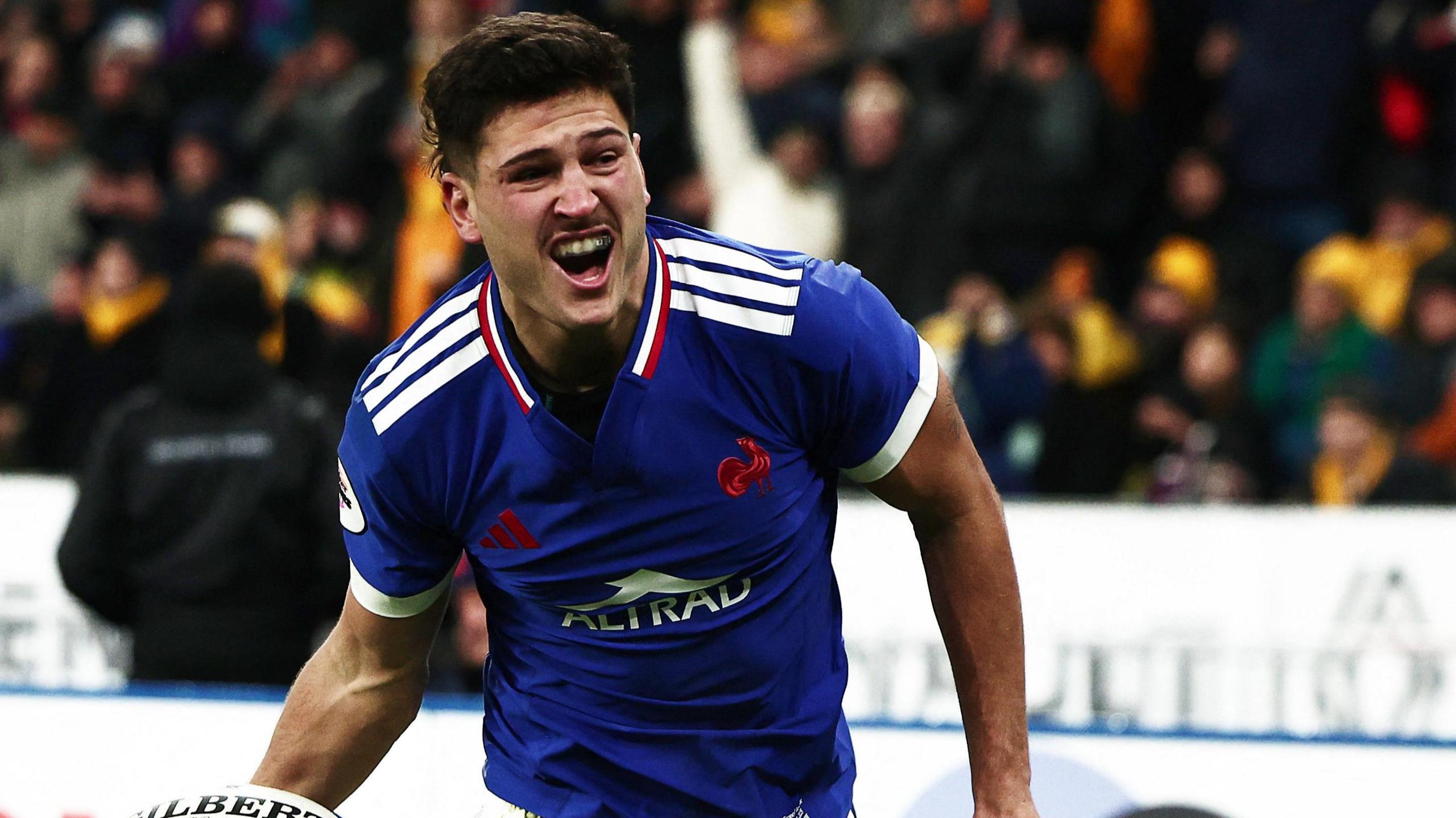 Nicolas Depoortere celebrating scoring a try