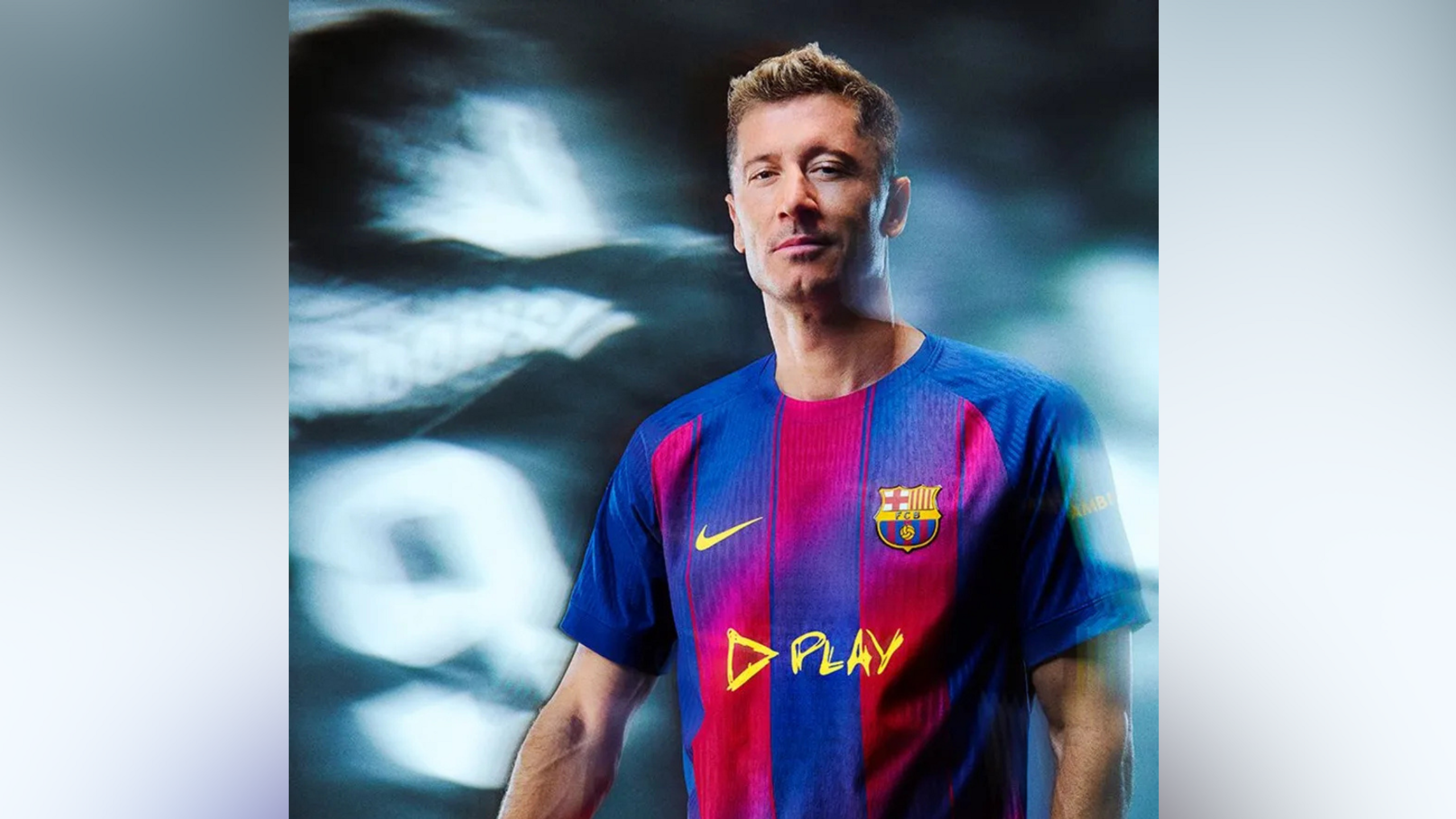 Robert Lewandowski wearing a home FC Barcelona kit while looking into the camera