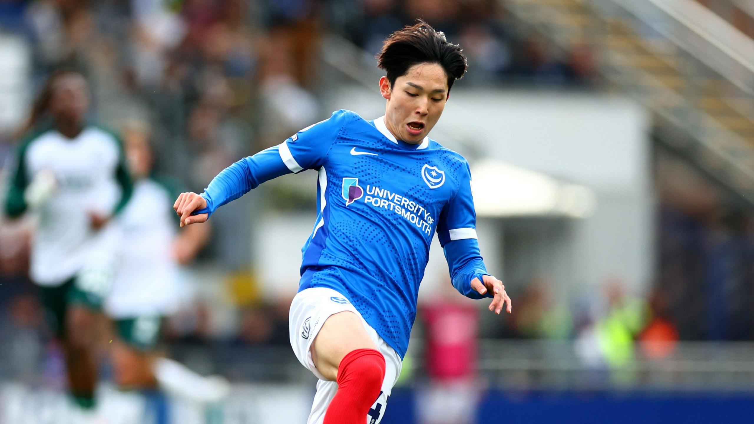 A photo of Minhyeok Yang playing for Portsmouth