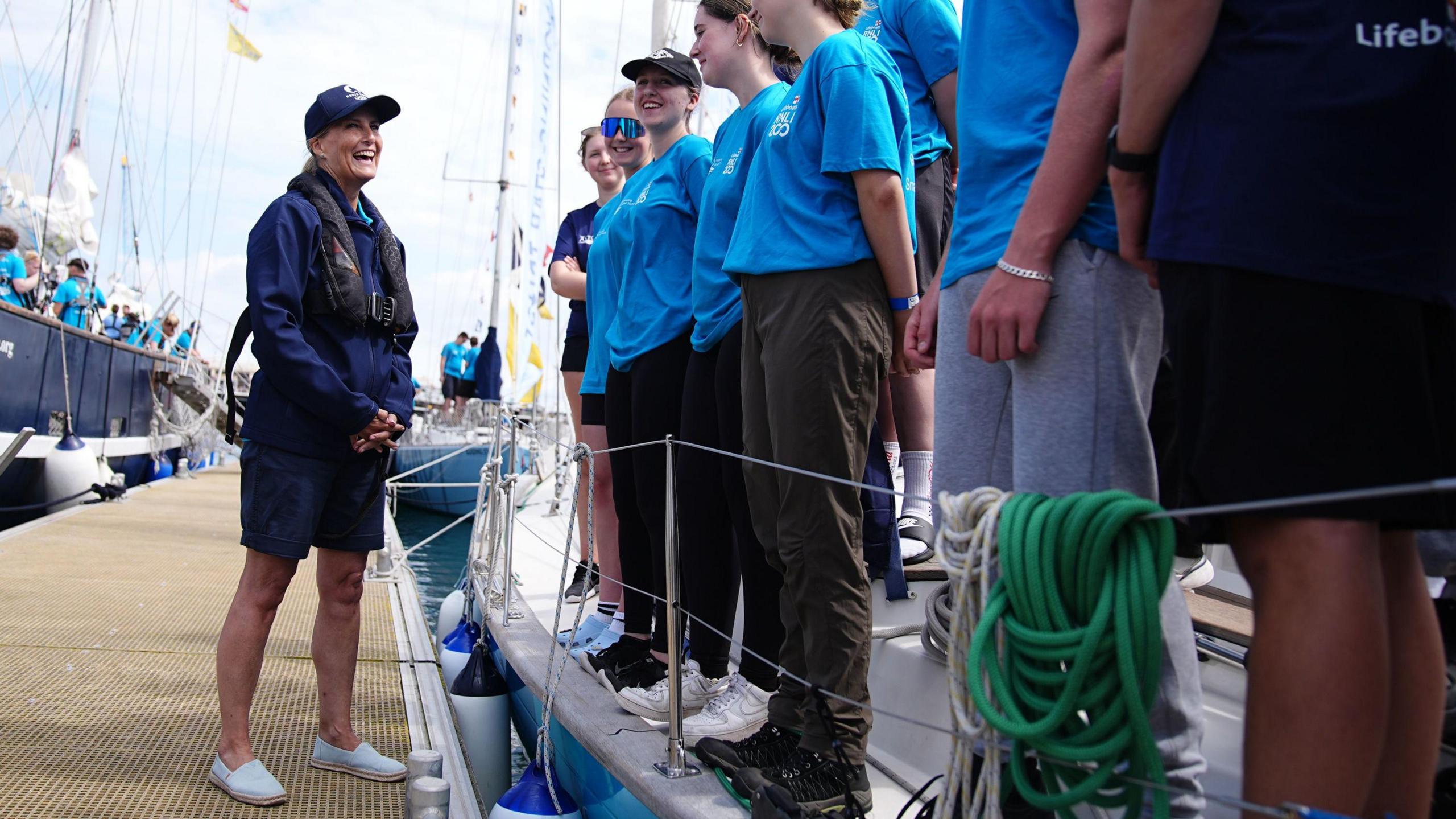 The Duchess of Edinburgh speaks to boat crews at Guernsey harbour after a trip on the Ocean Youth Trust South's vessel the Prolific, during her visit to Guernsey