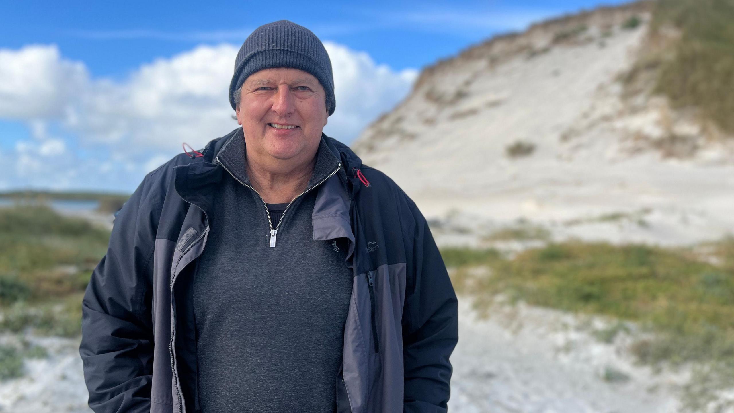 Clive Struver on the beach where the shipwreck was found