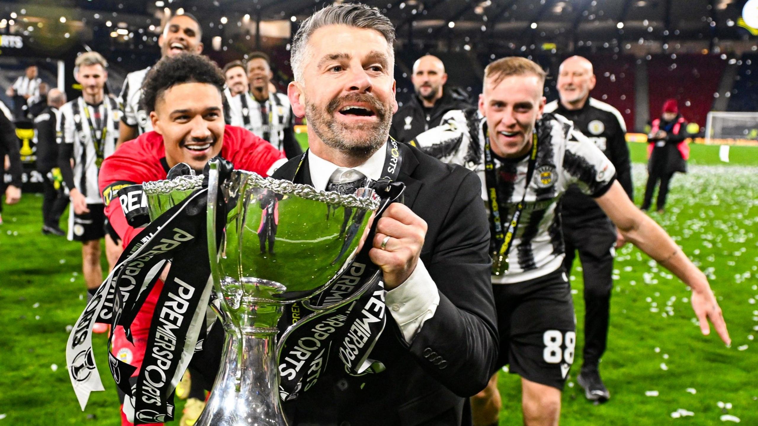 St Mirren Manager Stephen Robinson celebrates with the Premier Sports Cup Trophy at full time during a Premier Sports Cup Final match between St Mirren and Celtic at Barclays Hampden