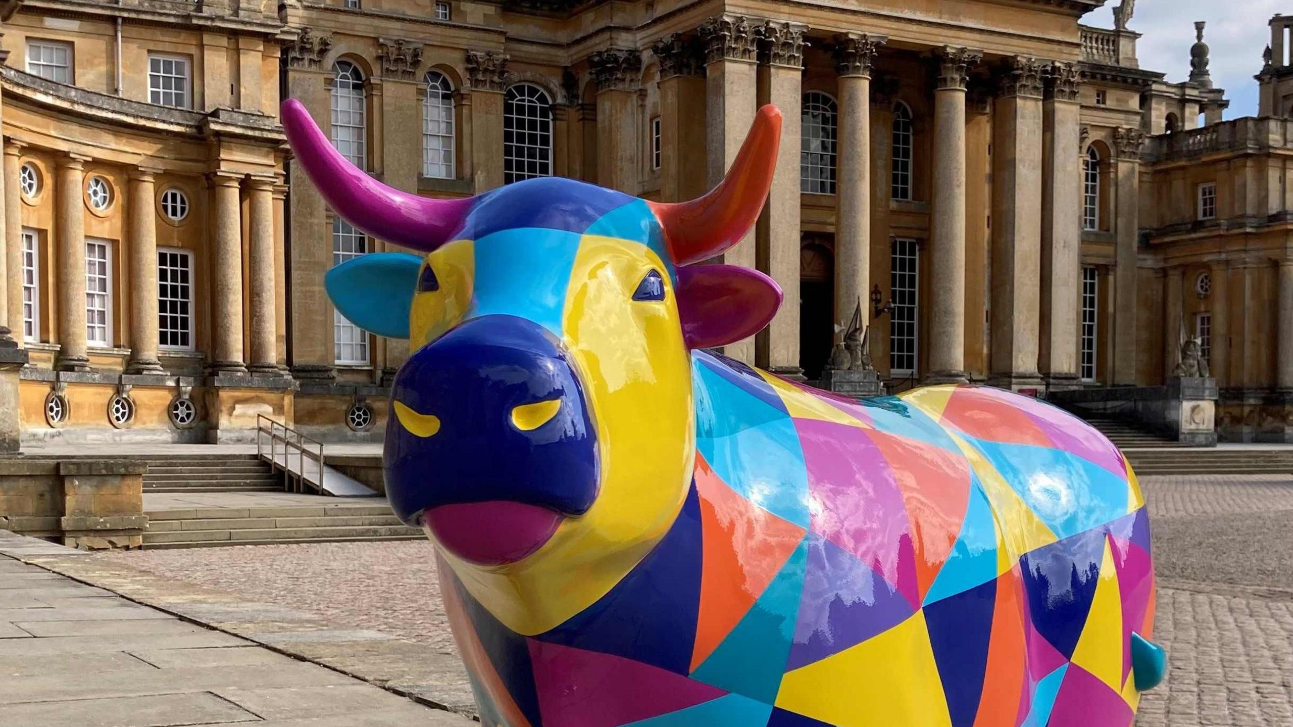 A sculpture of a colourful ox at Blenheim Palace