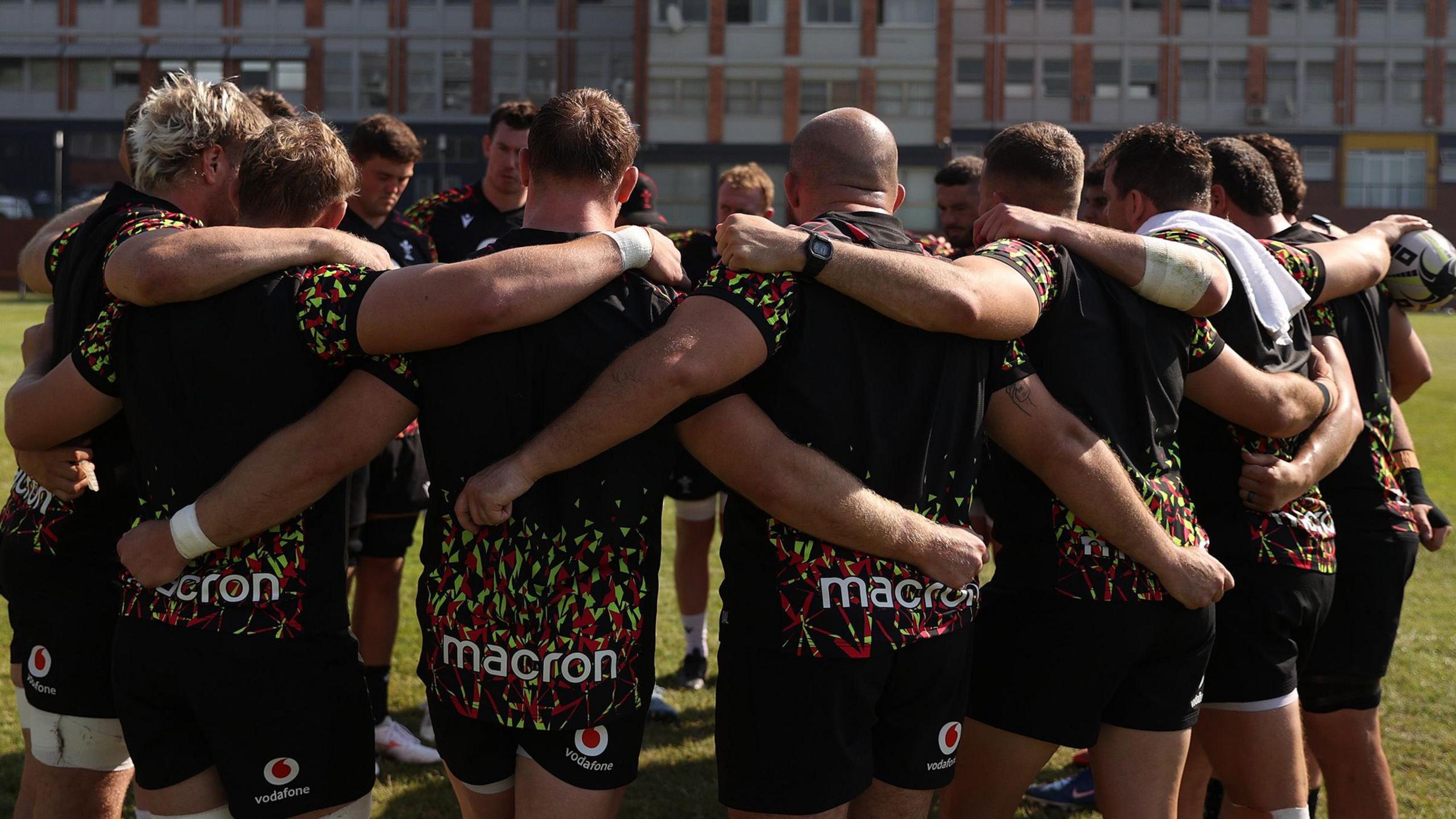 Wales squad in a huddle in their final training session of the 2025-26 season