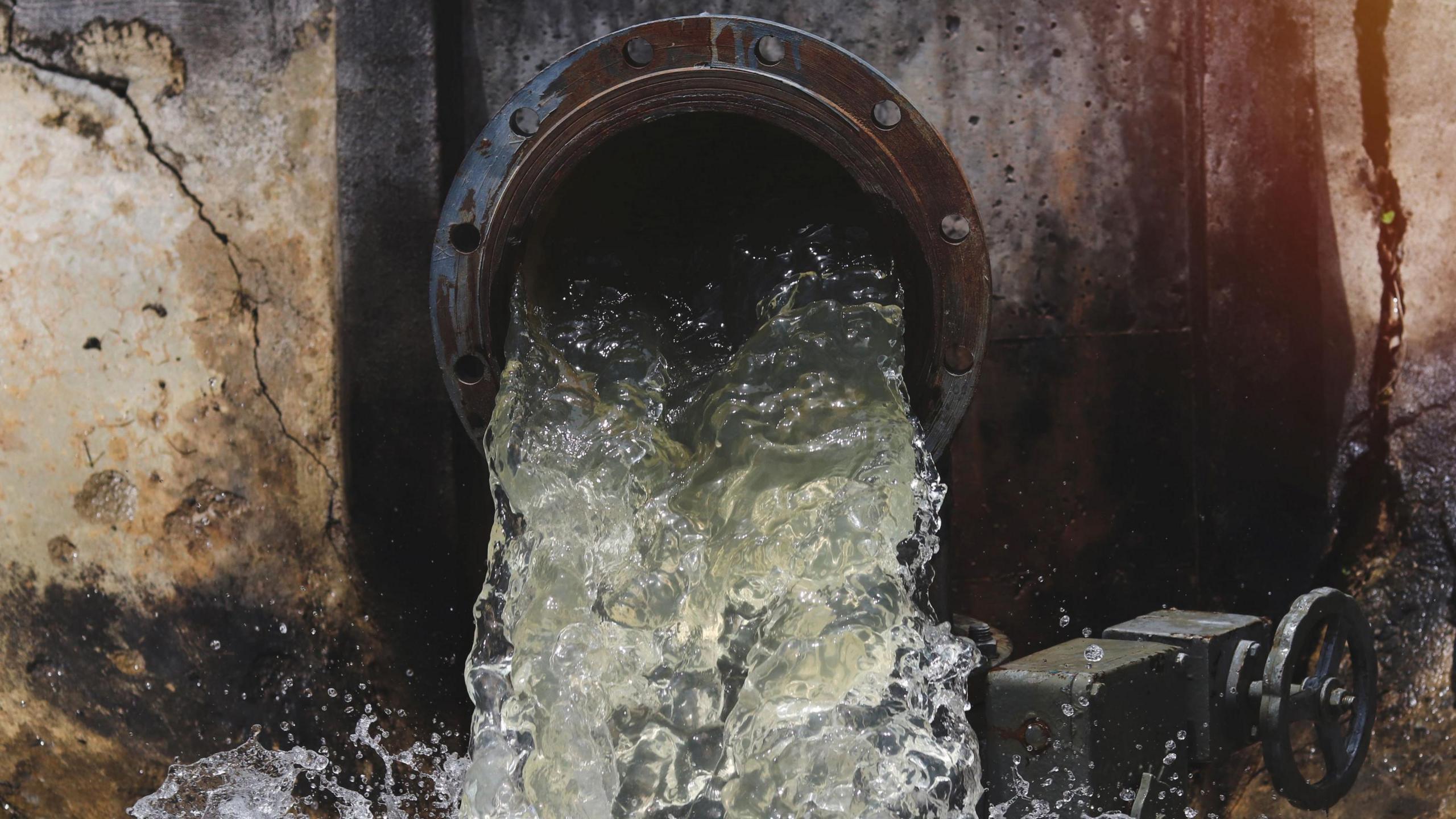 A drain pipe releasing dirty water