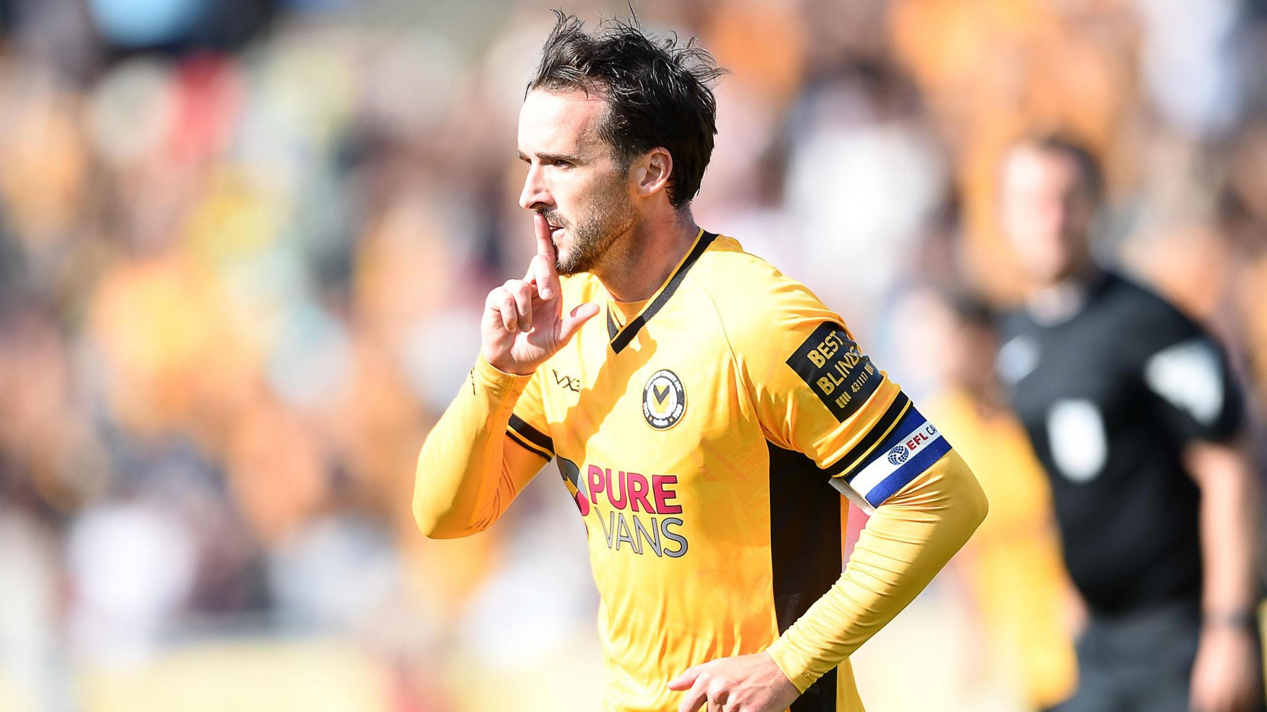 Aaron Wildig celebrates his goal for Newport County against Accrington