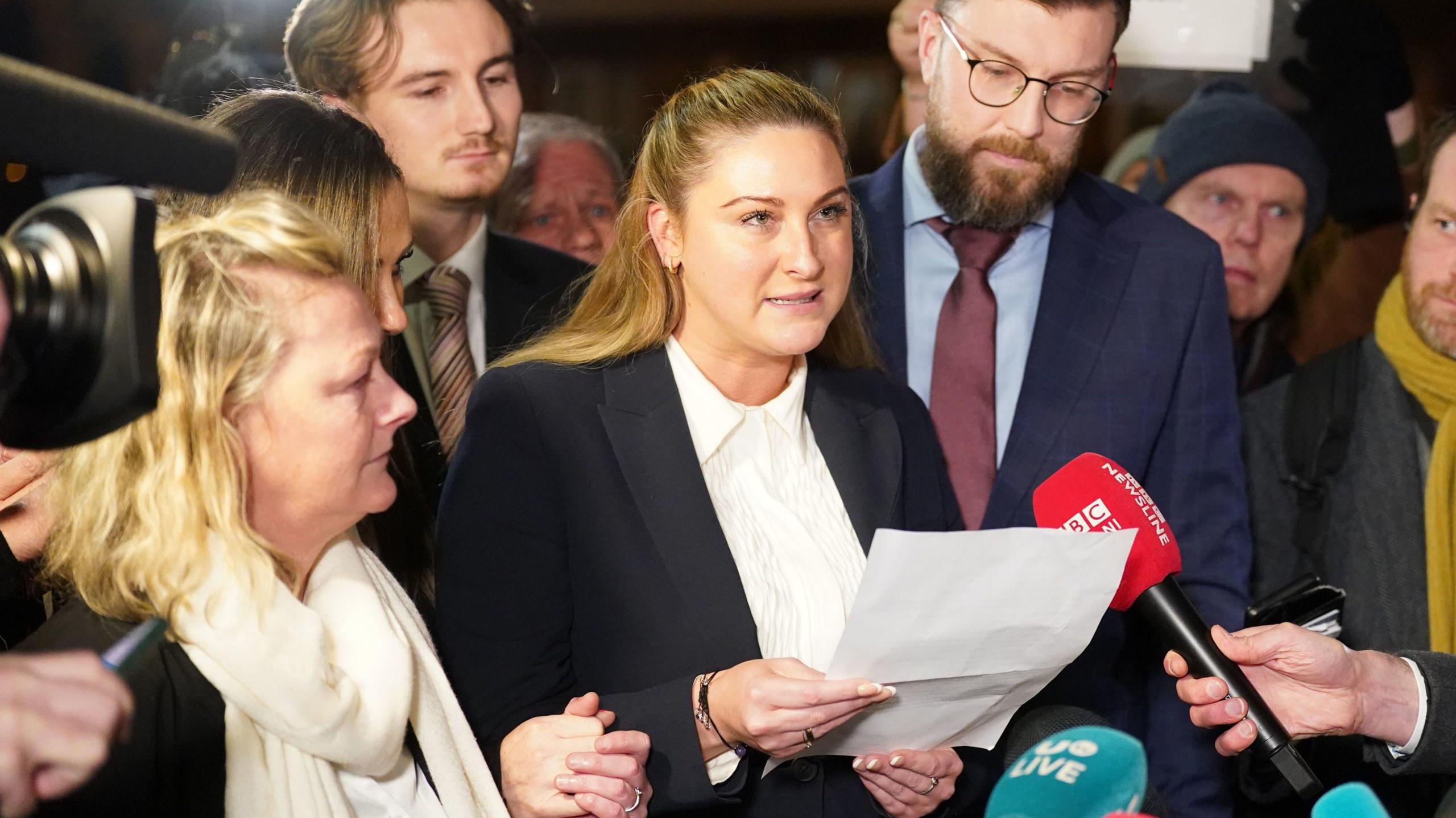 Nikita Hand speaking to media outside a Dublin courthouse