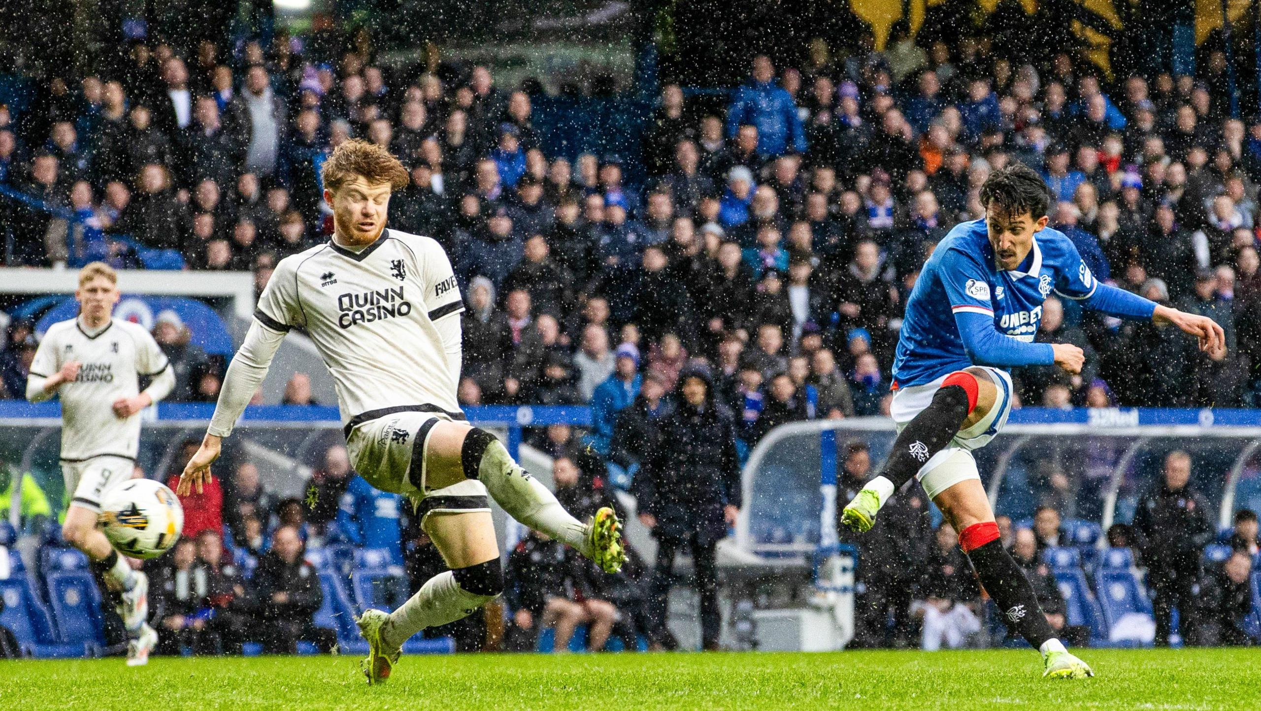 Rangers' Bojan Miovski (right) scores