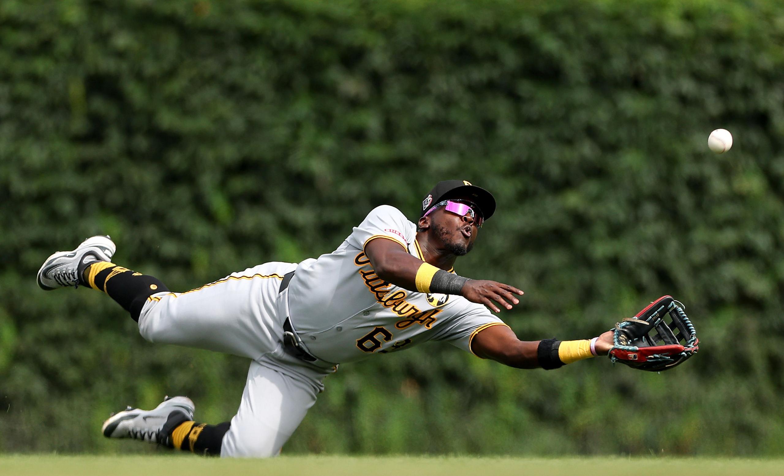 Pittsburgh Pirates' Ronny Simon fails to catch a ball hit by Carson Kelly of the Chicago Cubs during the sixth inning at Wrigley Field in Chicago, Illinois. Photo by Luke Hales