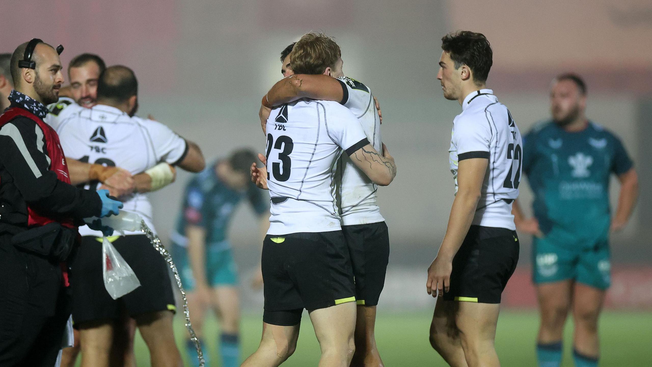 Black Lion players celebrate beating Scarlets