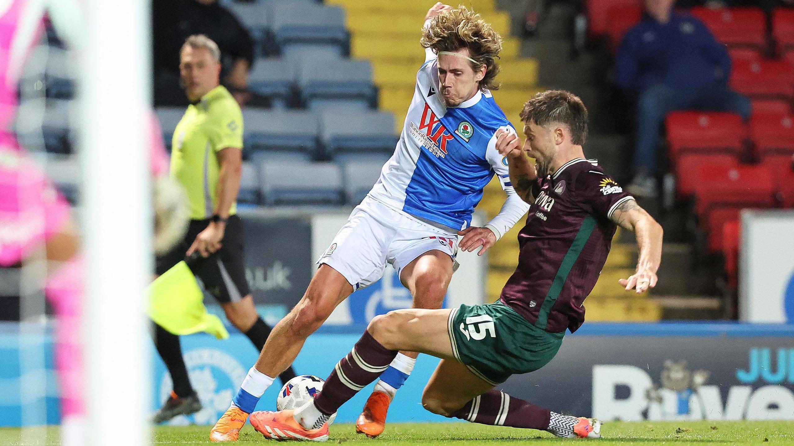Cameron Burgess challenges Todd Cantwell