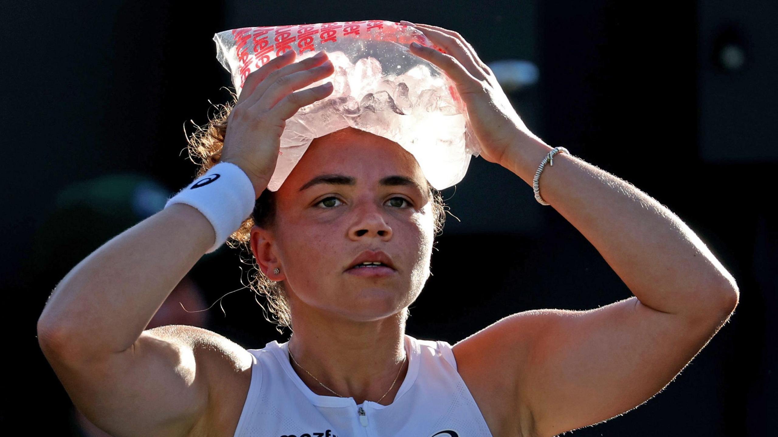 Jasmine Paolini with ice pack on head at Wimbledon