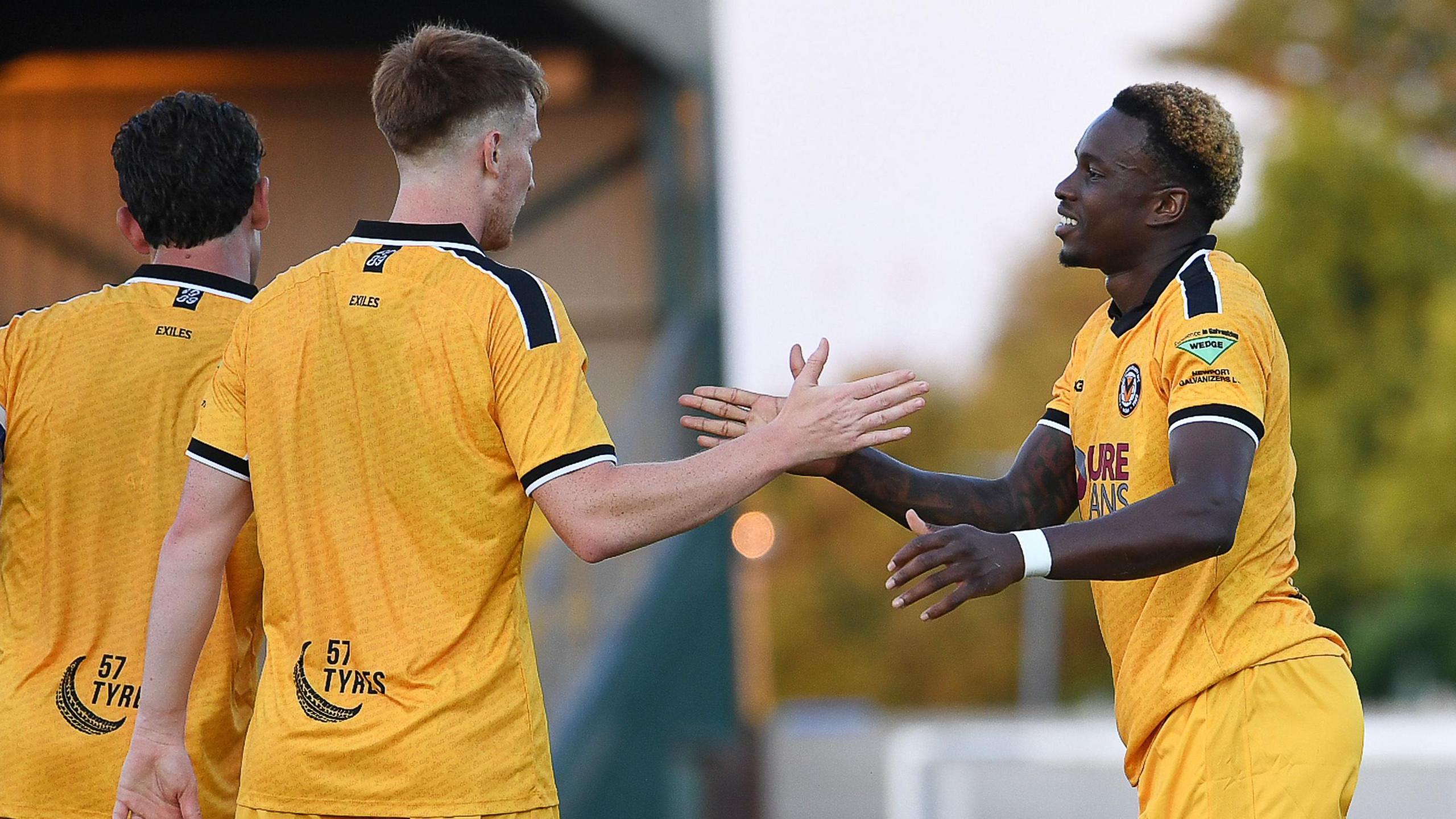 Shaquille Gwengwe celebrates scoring for Newport County at Newport City
