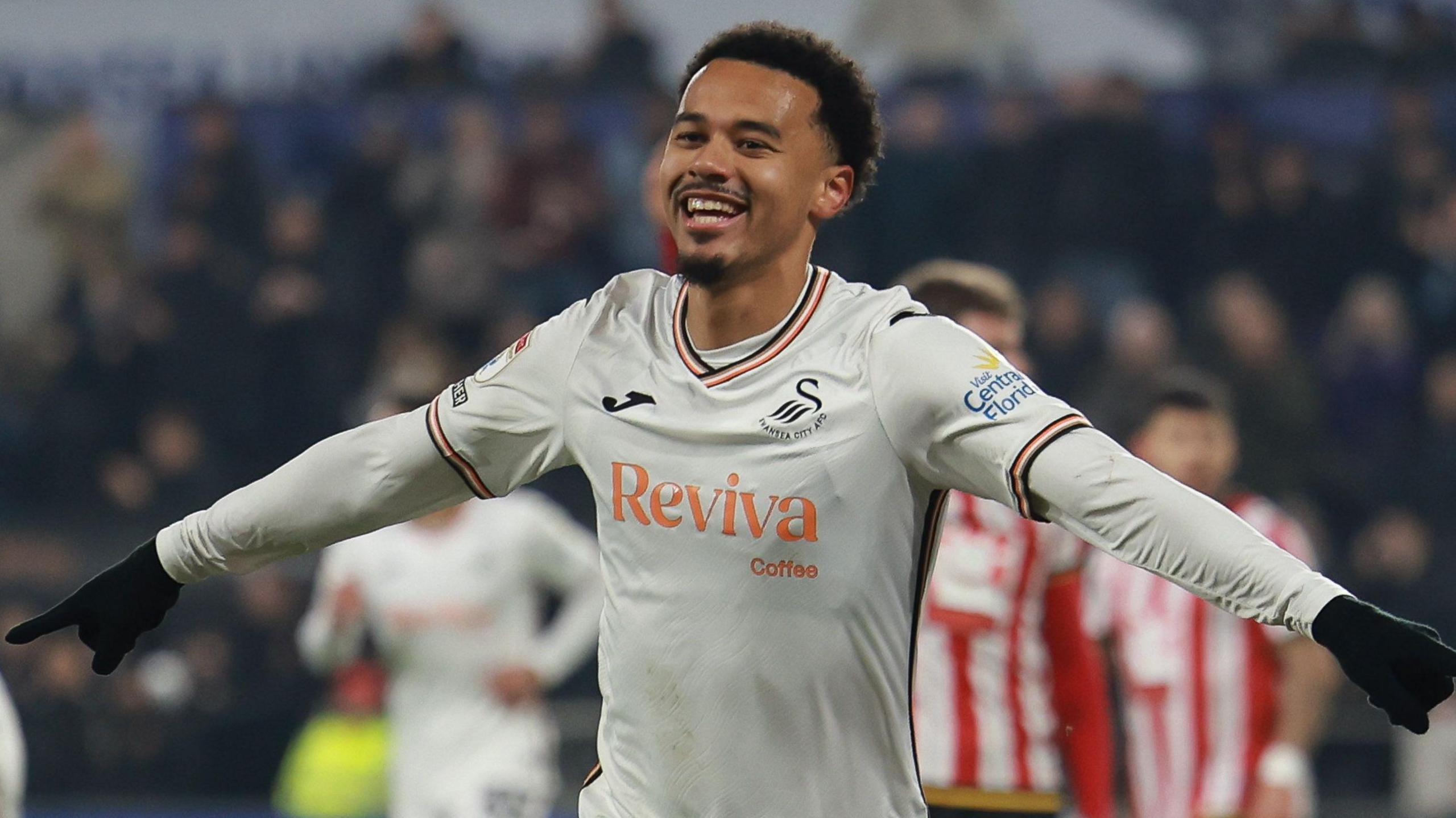 Florian Bianchini celebrates a Swansea goal