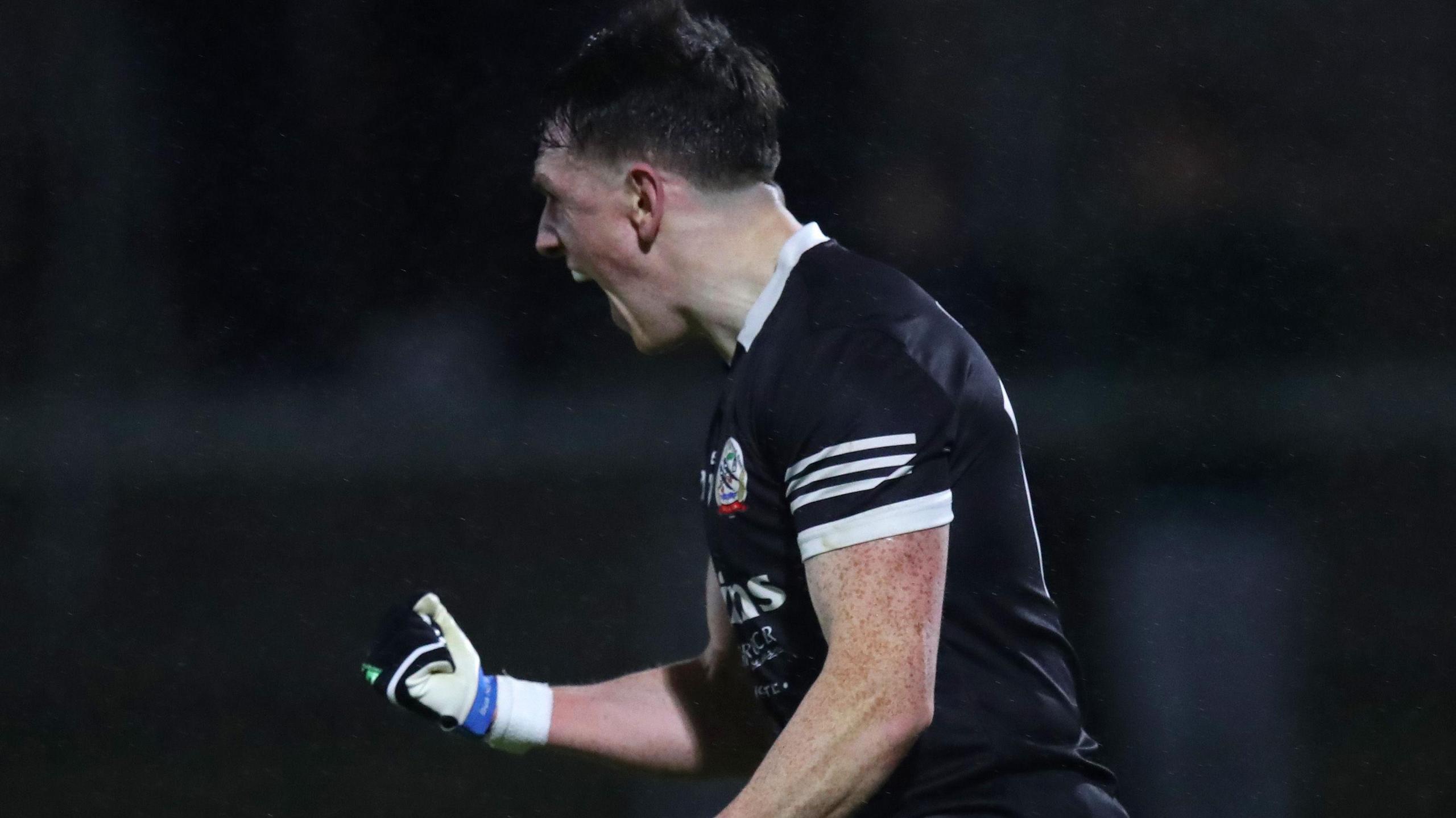 Christopher Rooney celebrates scoring a goal for Kilcoo at the Athletic Grounds