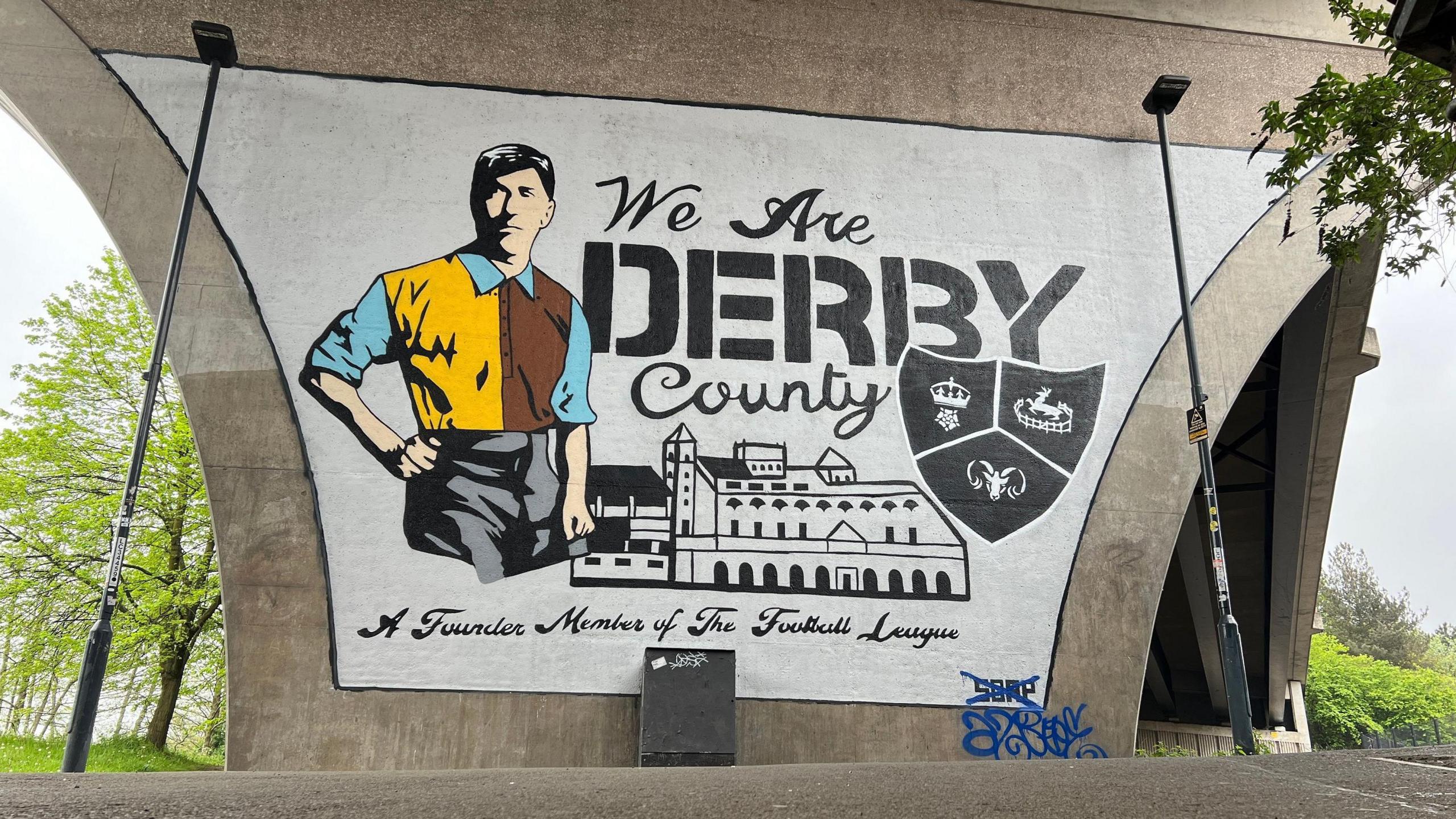 Mural on an underpass of Derby County legend Steve Bloomer