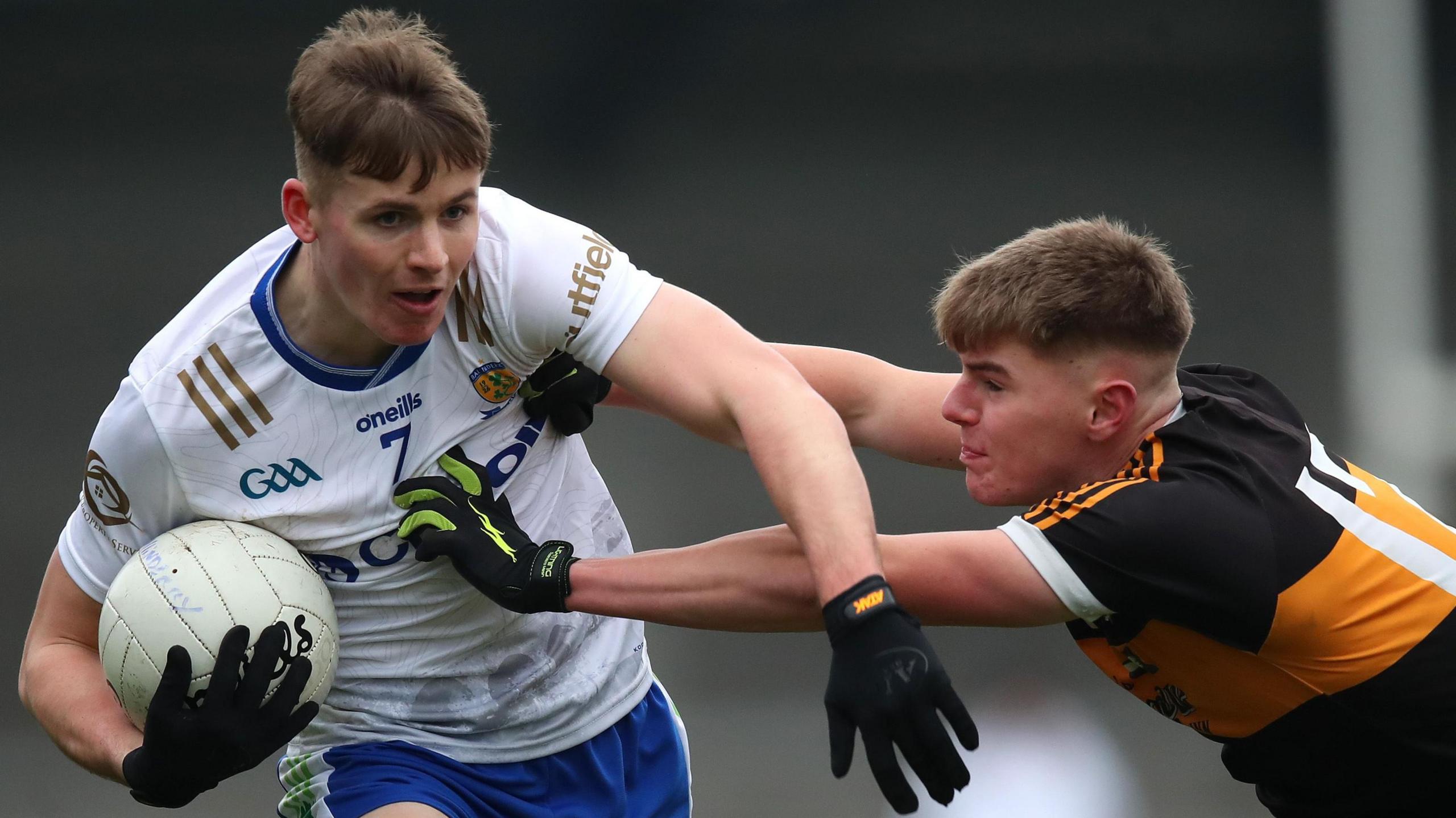 Ballinderry's Ruairi Forbes (left) attempts to get past Austin Stacks' Daniel Kirby in last Saturday's All-Ireland Intermediate Club semi-final at Parnell Park