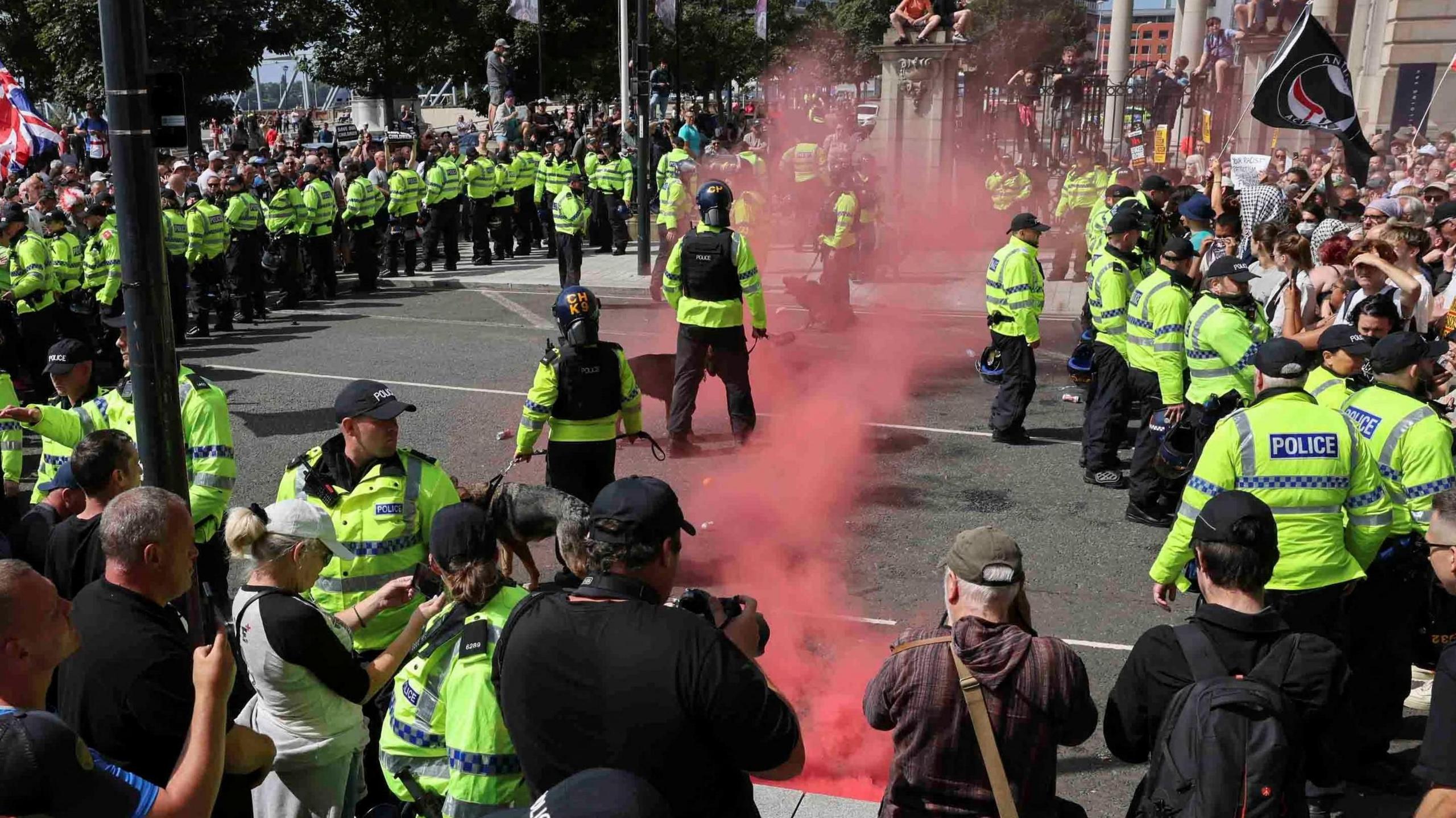 Police and protestors face off in Liverpool