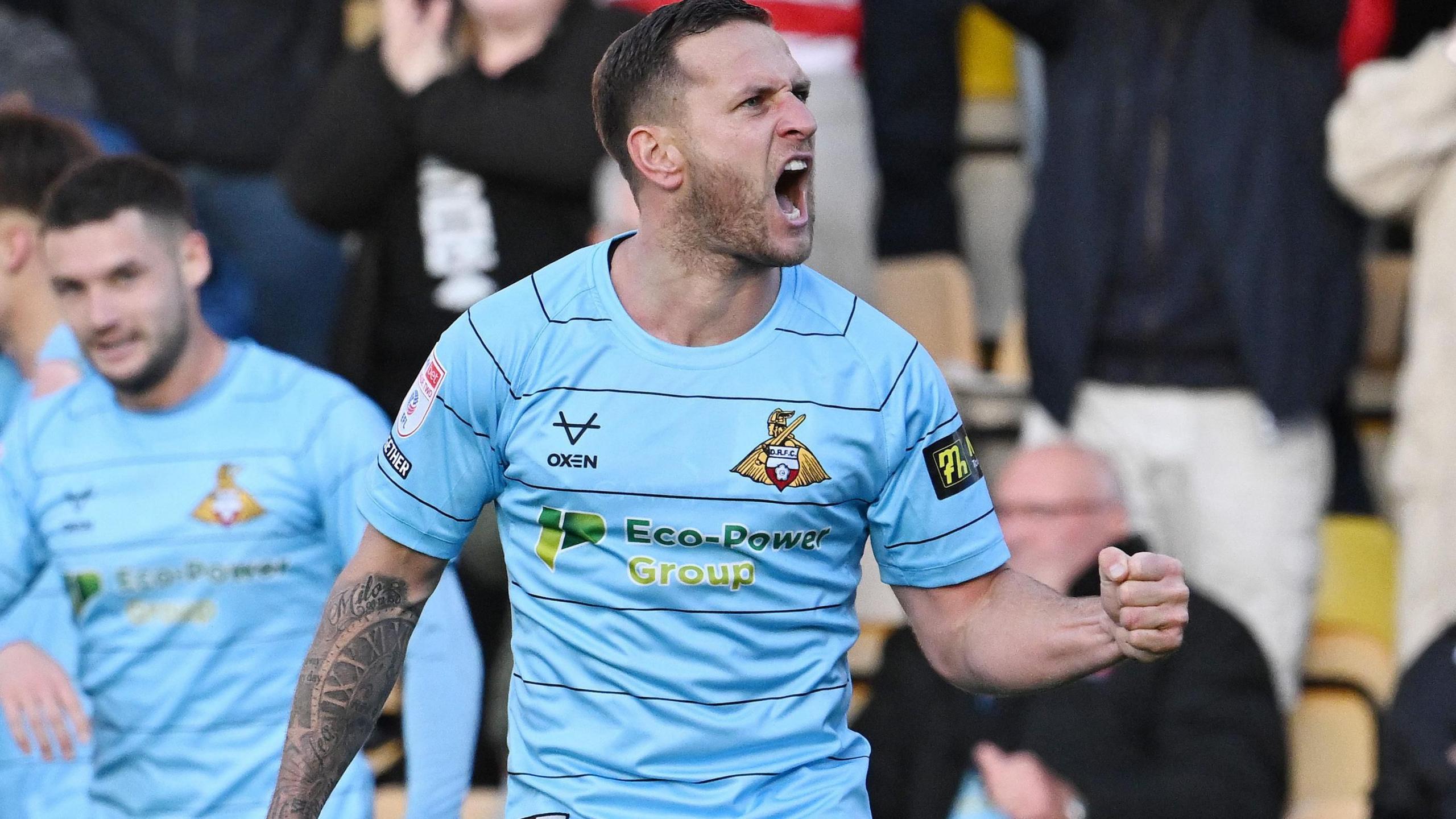 Billy Sharp celebrates after scoring for Bradford City