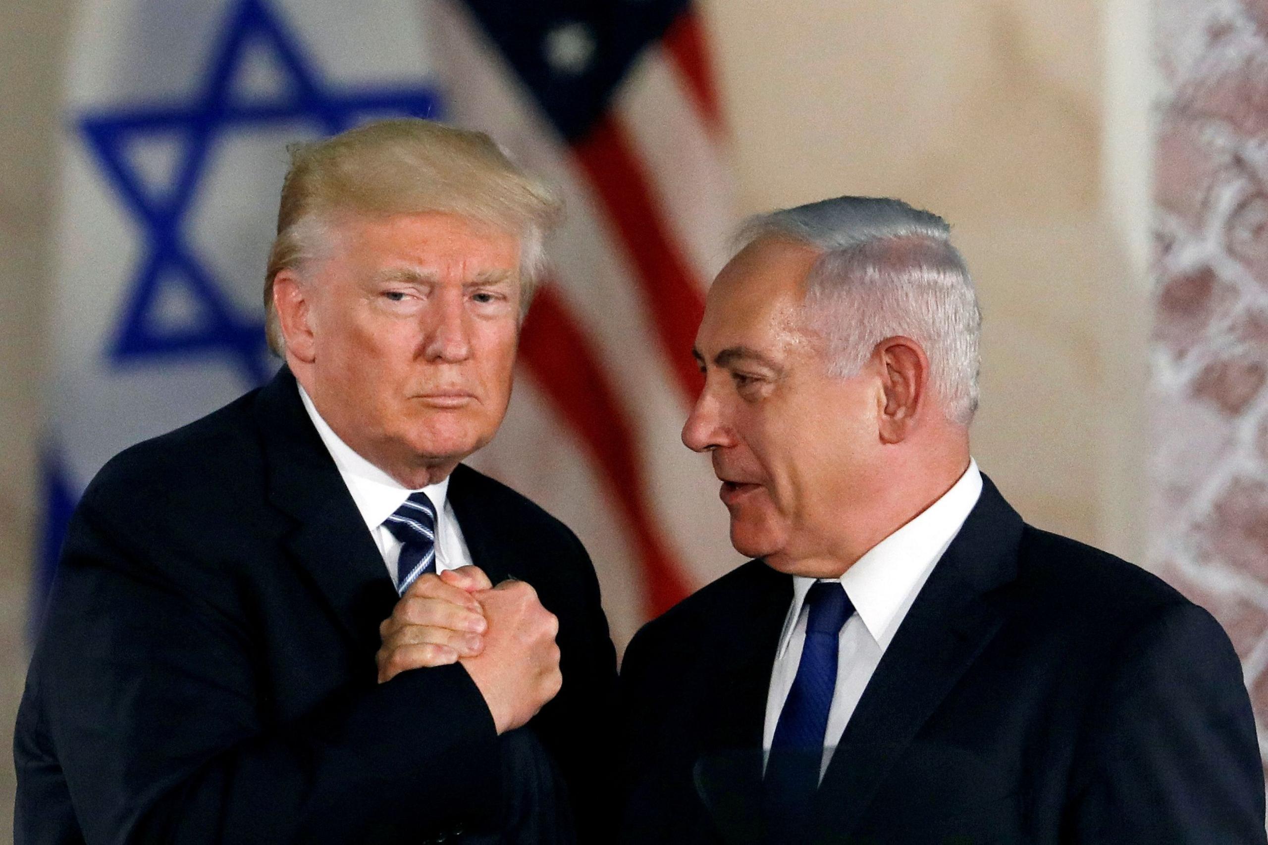 U.S. President Donald Trump and Israeli Prime Minister Benjamin Netanyahu shake hands after Trump's address at the Israel Museum in Jerusalem 