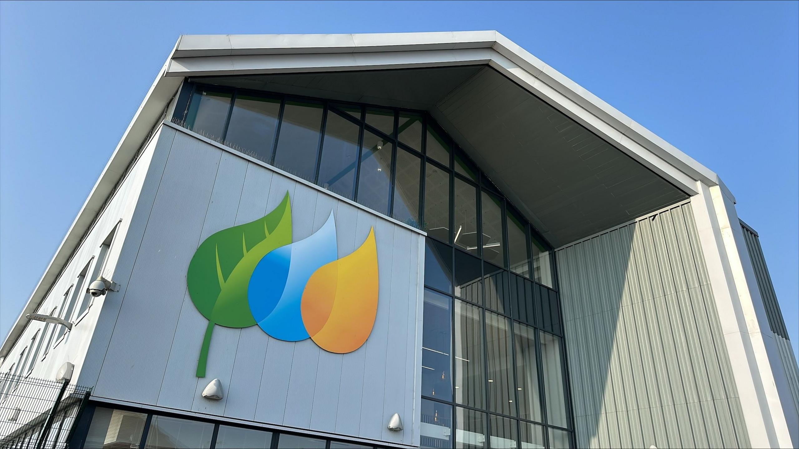 A Scottish Power building with a logo showing three leaves, in green, blue and yellow