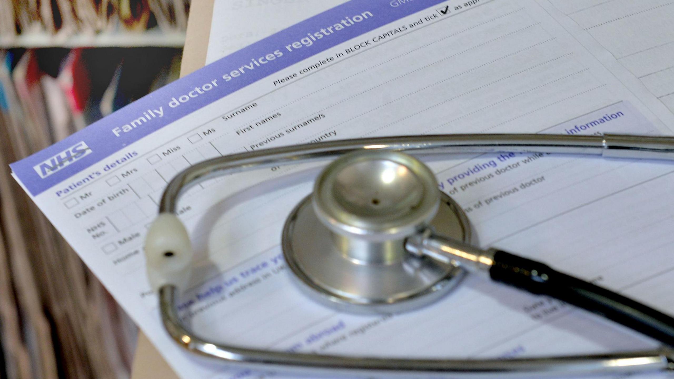 Stethoscope and GP paperwork