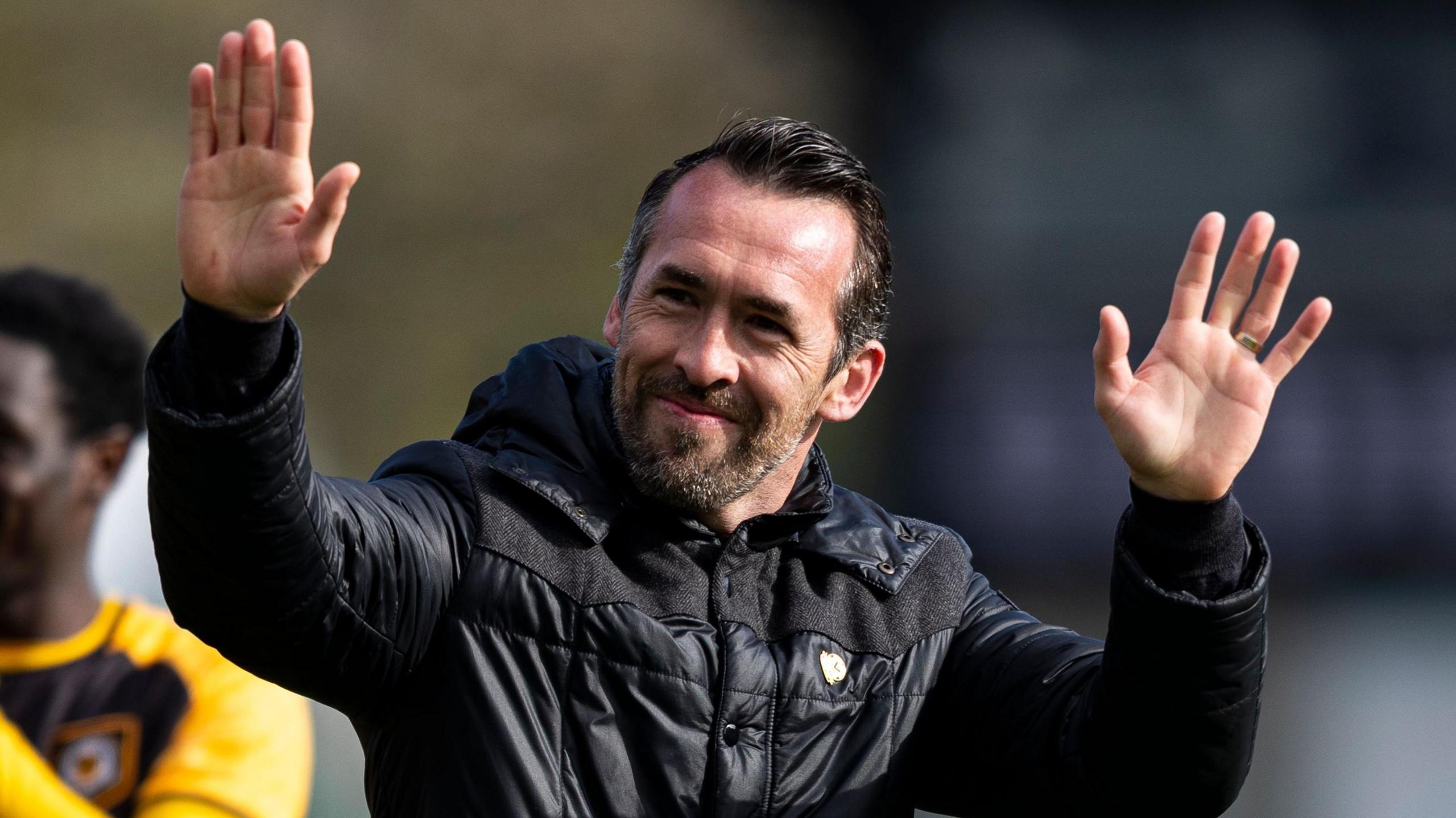 Christian Fuchs waves to the Newport County fans