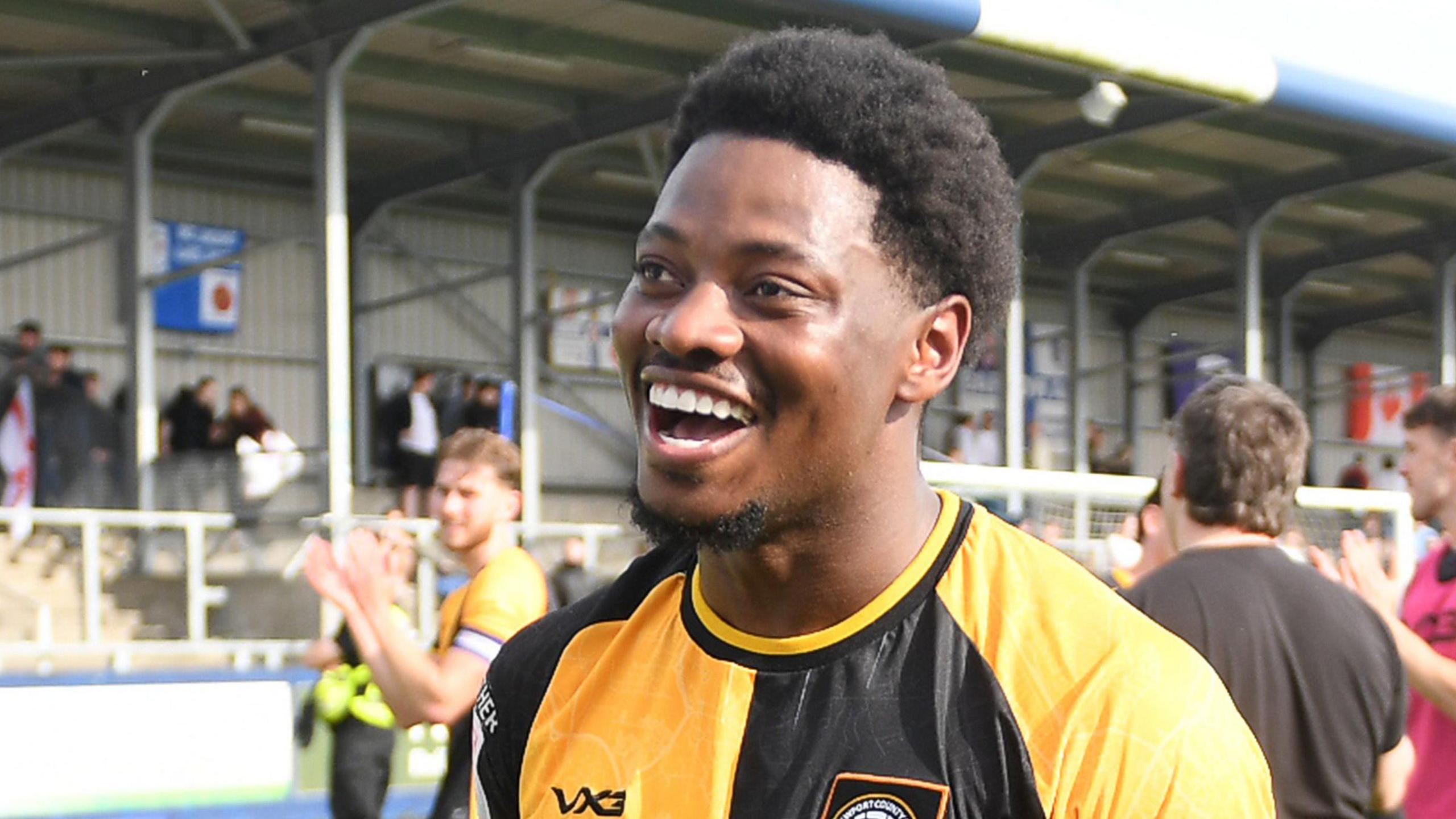 Bobby Kamwa celebrates at Barrow on the final day of the season