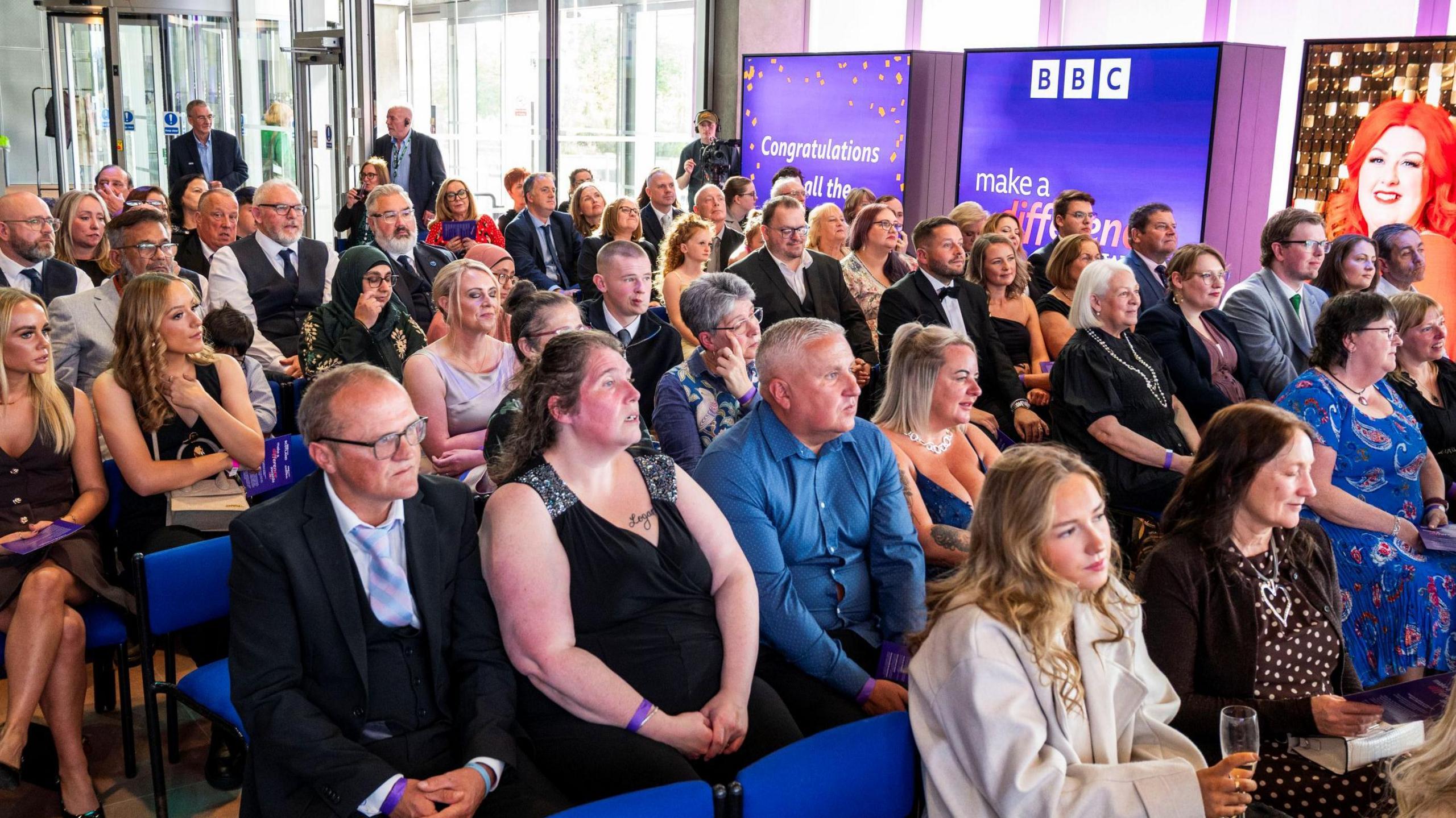 People sit waiting to hear the winners at the ceremony in Glasgow.