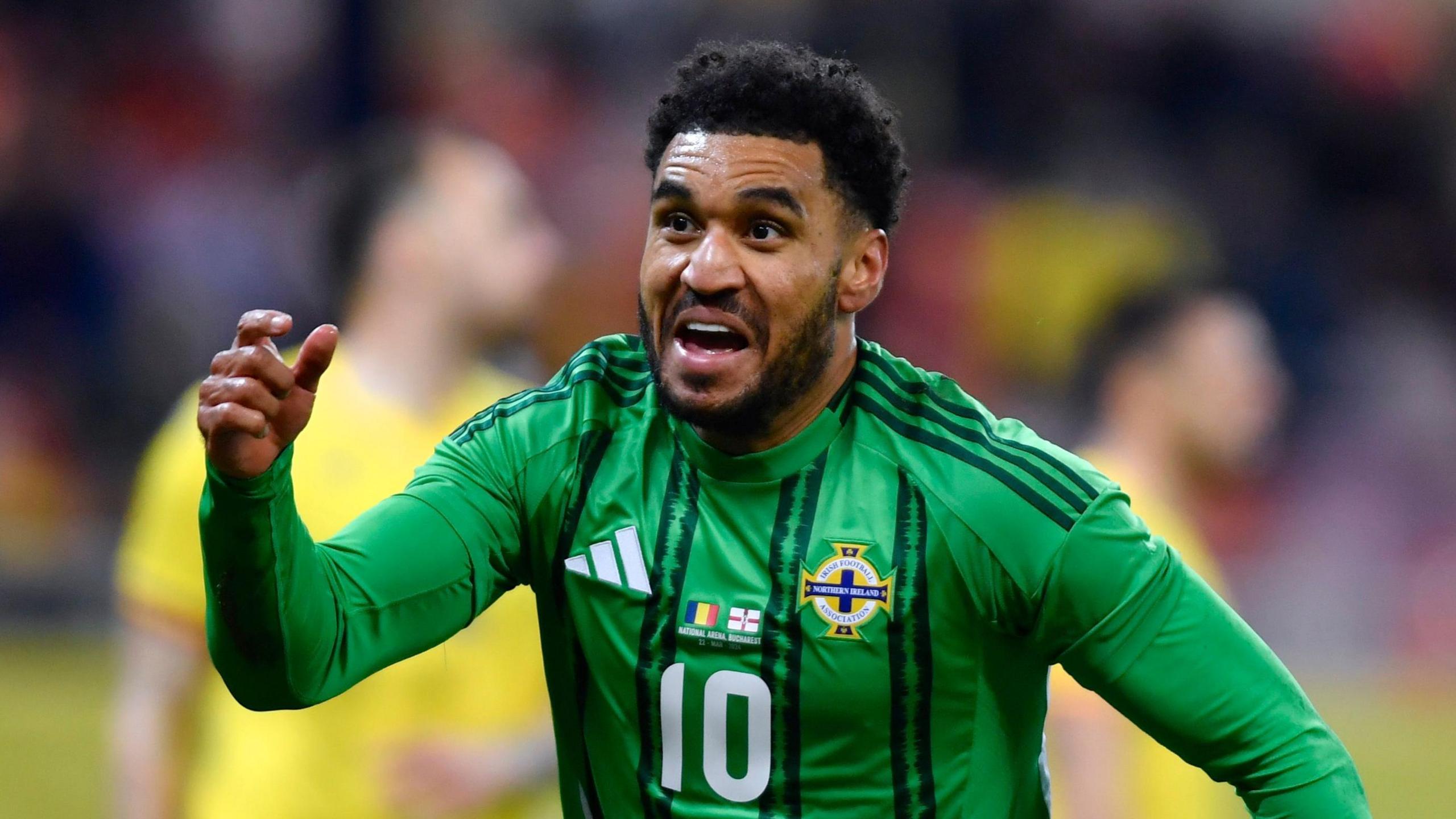 Jamie Reid scores for Northern Ireland against Romania