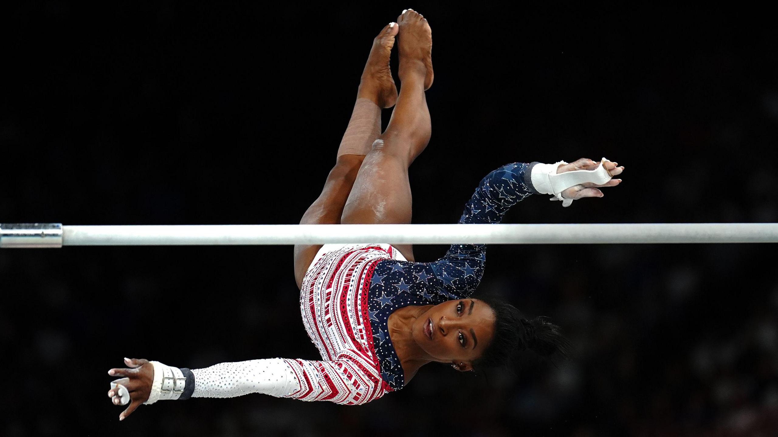 USA’s Simone Biles performs on the Uneven Bars during the artistic gymnastics, women’s team final, at Bercy Arena on the fourth day of the 2024 Paris Olympic Games in France